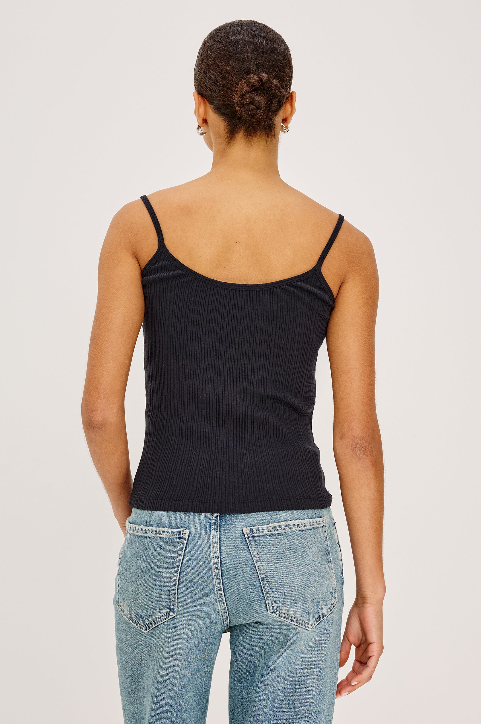 Nila Scoop Neck Fitted Tank Top With Ribbed Texture in Black Colorway - Upper Body Back View Featured on Model