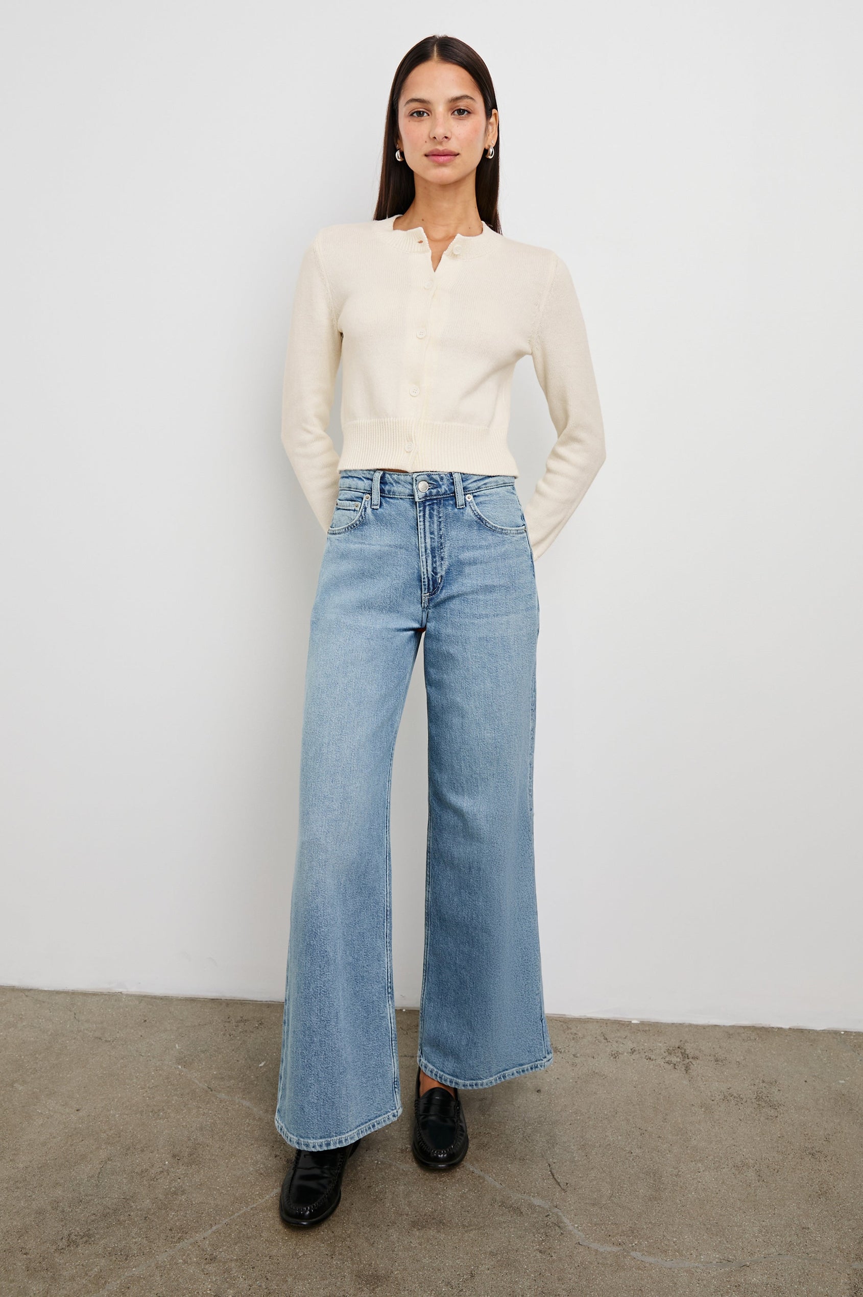 Norah Long-Sleeved Short Cardigan with Ribbed Trims and Matching Buttons in Ivory Colorway - Front Full Body View Featured on Model 