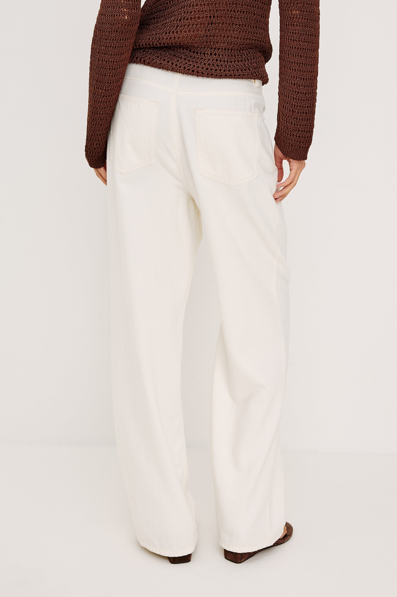Normandie Relaxed Pant in Cotton Lyocell Denim With Adjustable Drawstring Toggles and 5-Pocket Styling in Ivory Colorway - Lower Body Back View Featured on Model