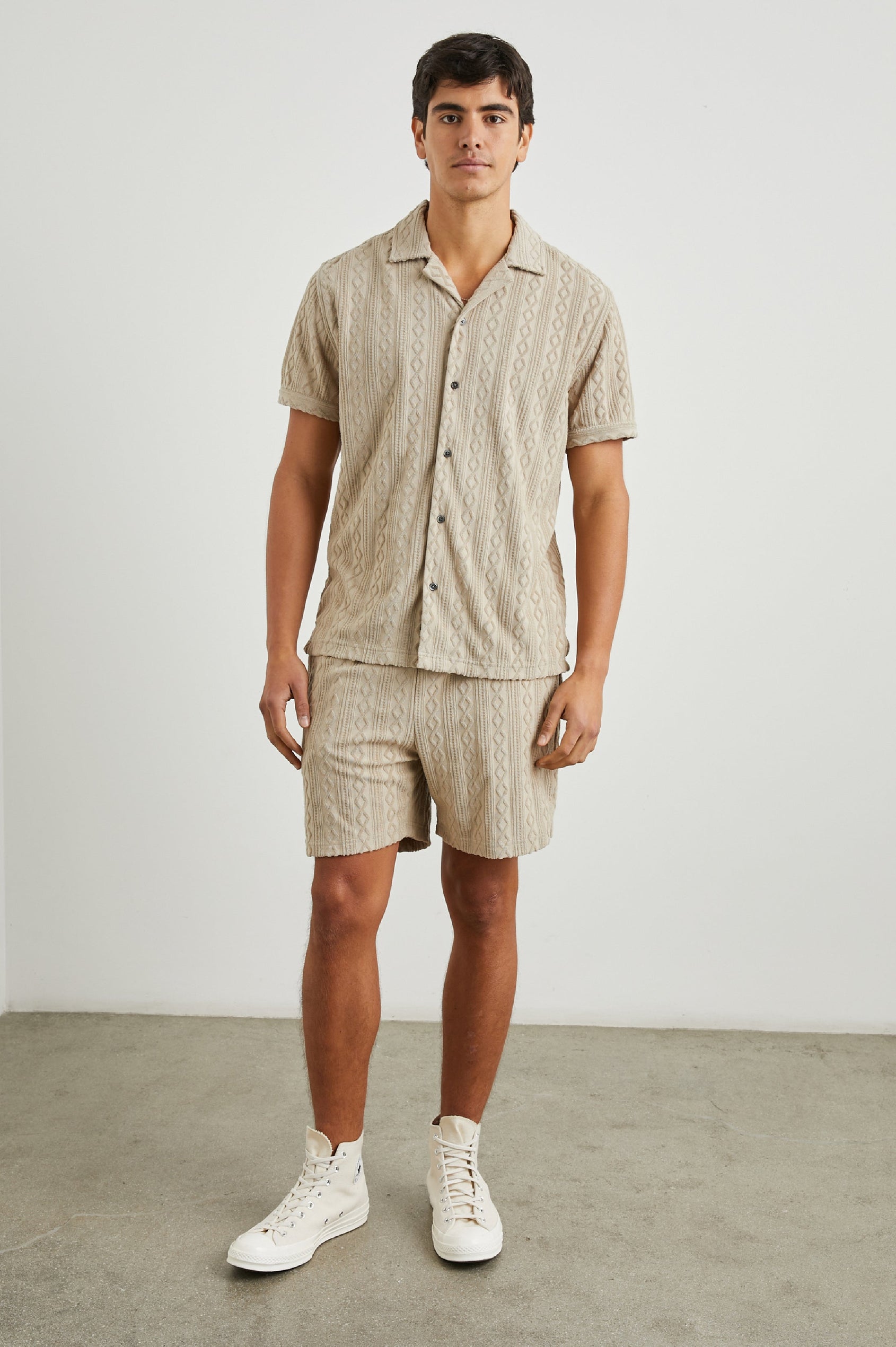 Nova Shorts with a Drawstring Waist, a Raised Jacquard Pattern, Two Front Pockets and a Back Patch Pocket in Craft Paper Colorway, a Light Brown - Front View Featured on Model
