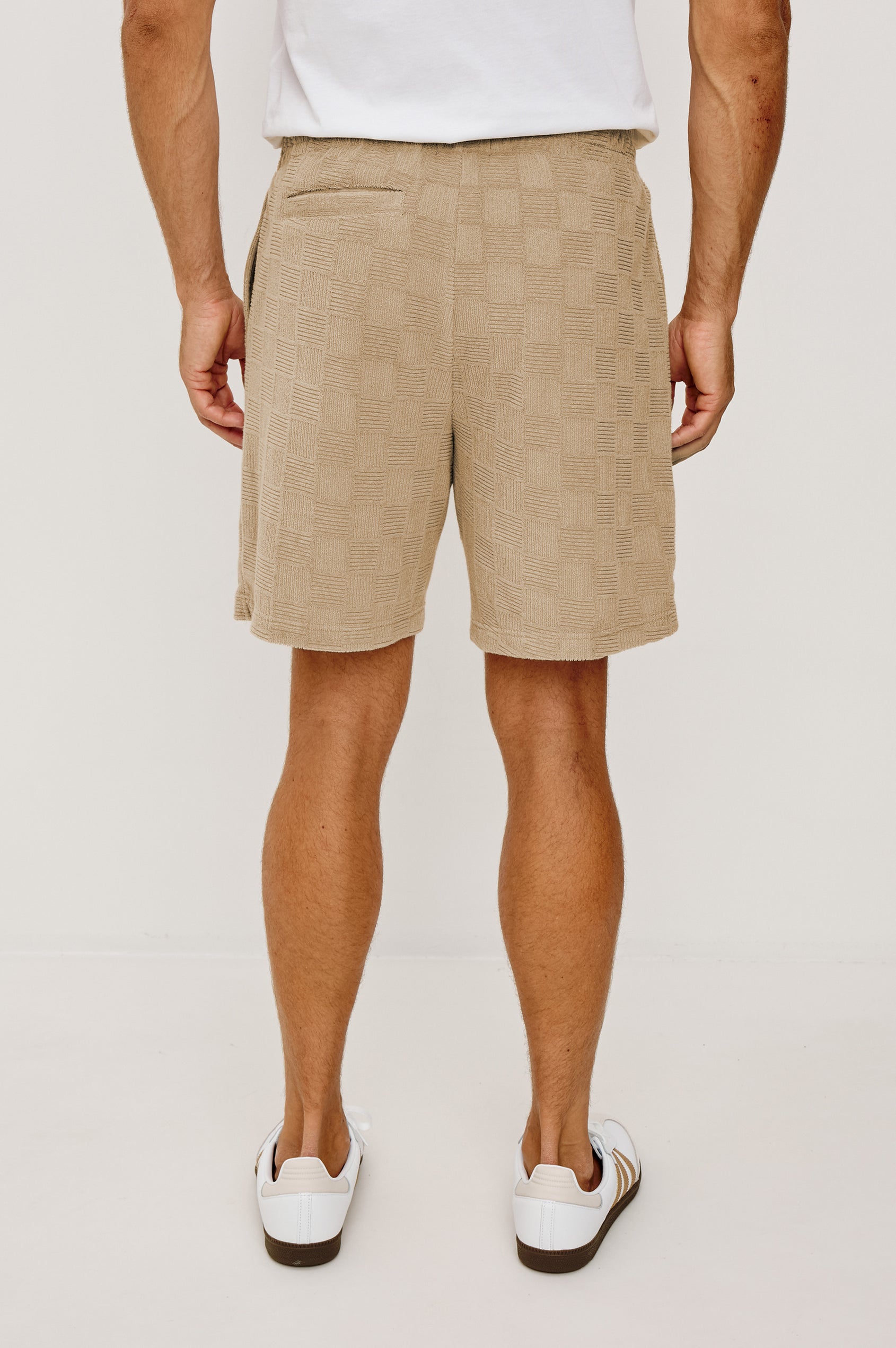 Nova Short in French Terry With Raised Jacquard Pattern, Side Pockets, and Drawstring Waist Ties in Grange Craft Paper Colorway - Lower Body Back View Featured on Model