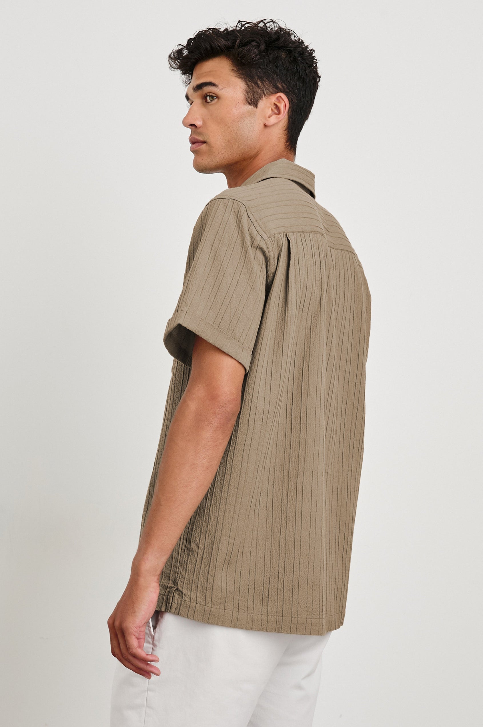 Ohana textured button up short sleeve shirt with collar and front chest pocket in Olive - back view on model