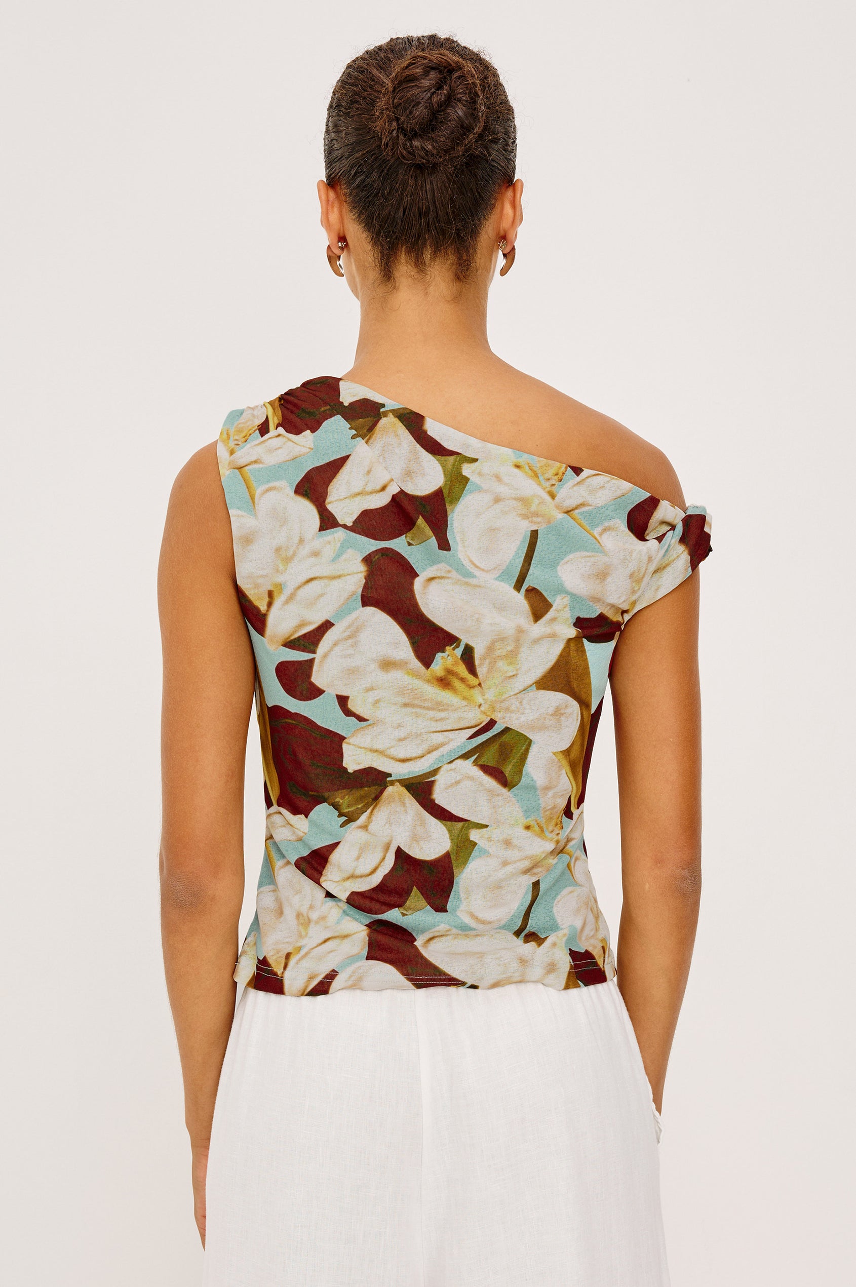 Orelia Fitted Top in Self-Lined Mesh With Twisted Shoulder Straps, and Asymmetrical One Shoulder Neckline in Plumeria Colorway - Upper Body Back View Featured on Model