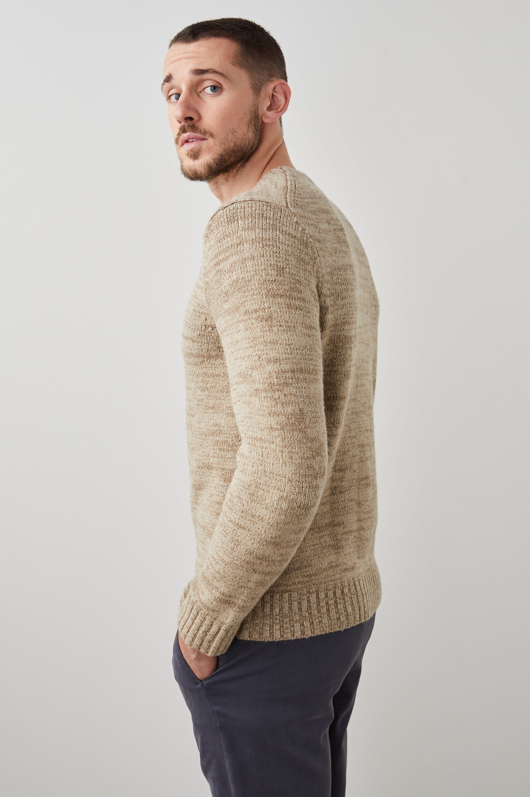 Orrin Long-Sleeve Sweater with a Crew Neck and Ribbed Trim in Toasted Barley Colorway - Side View Featured on Model 