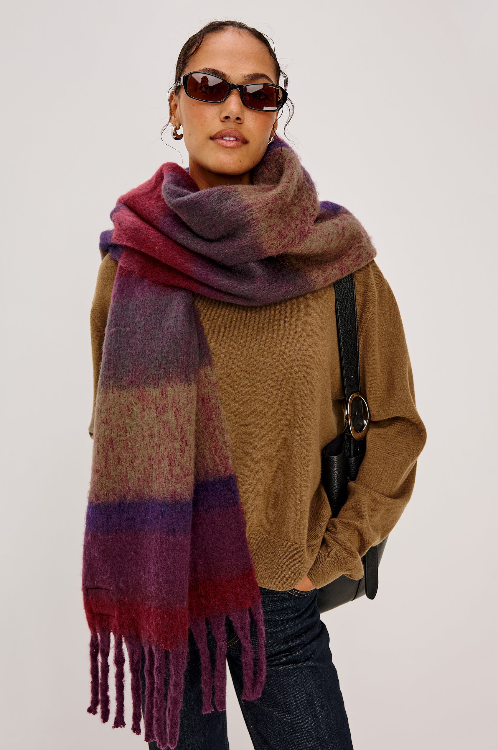Oslo Wide Oversized Scarf in Brushed Poly With Fringe Detailing in Jewel Stripe Colorway - Upper Body Front View Featured on Model