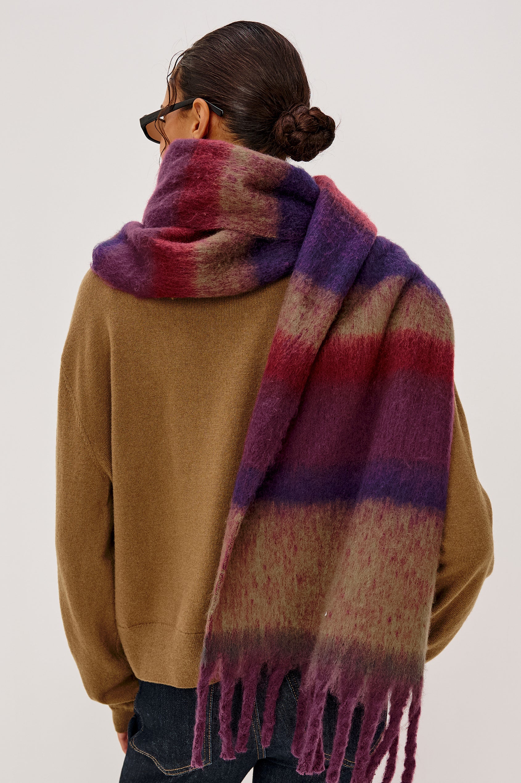 Oslo Wide Oversized Scarf in Brushed Poly With Fringe Detailing in Jewel Stripe Colorway - Upper Body Back View Featured on Model