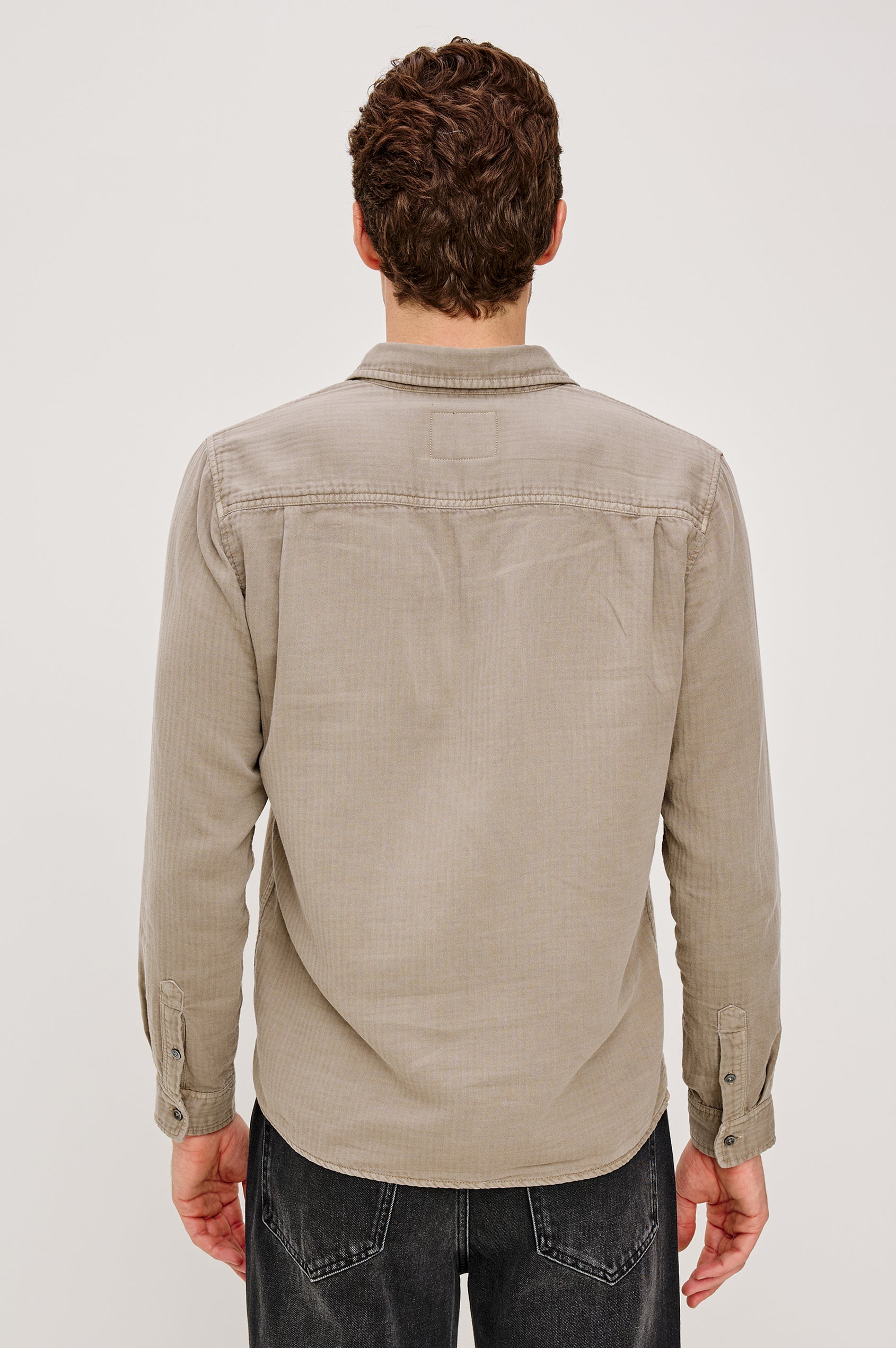 Owens Button-Up Shirt in Lightweight Cotton With Subtle Texture, Collar, Long Sleeves, and Chest Patch Pocket in Desert Path Colorway - Upper Body Back View Featured on Model