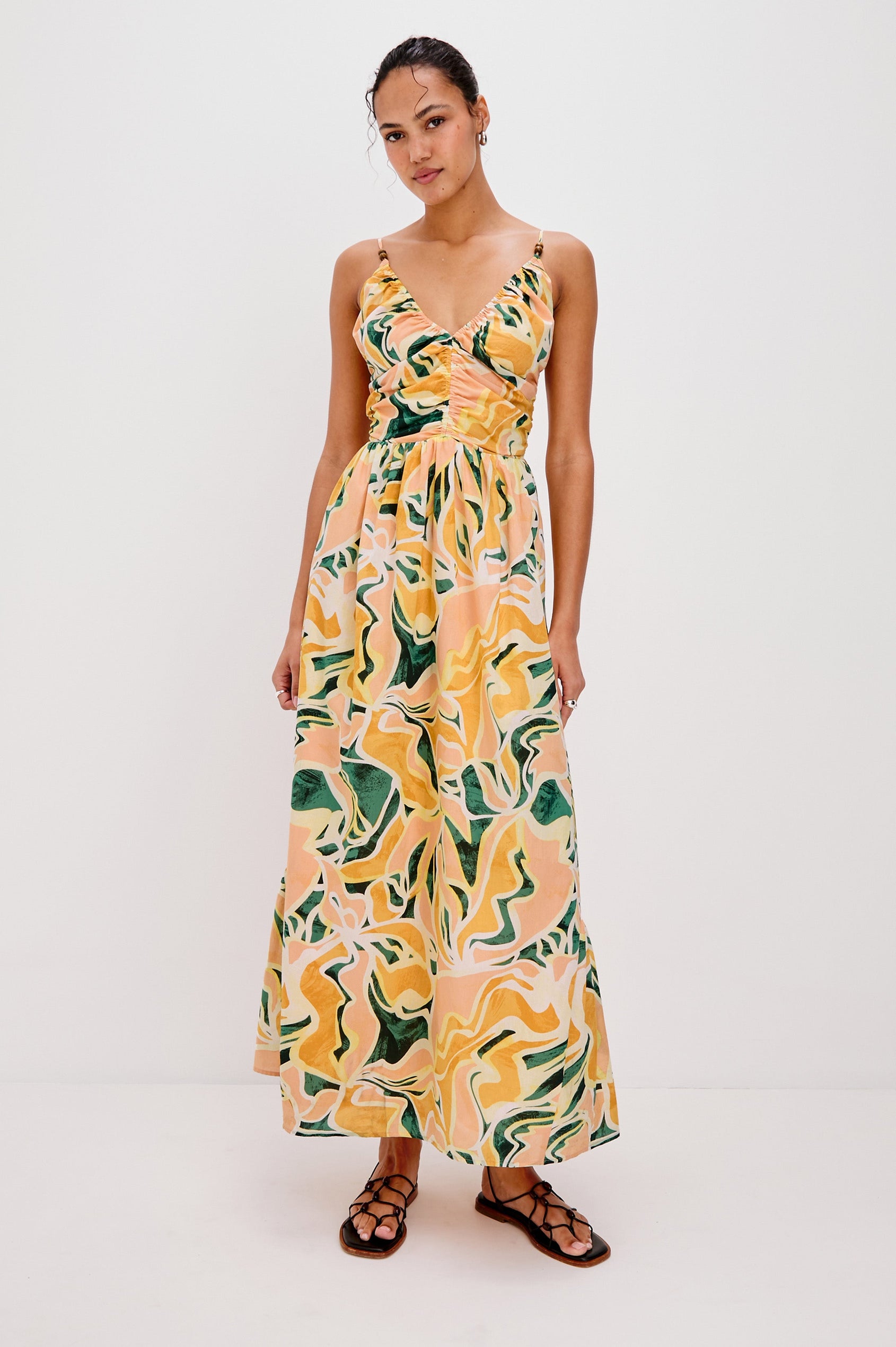 Palm V-Neck Midi Dress with Spaghetti Straps and Gathering Details on Bodice in Tulum Colorway. Full Body Front View Shown on Model.