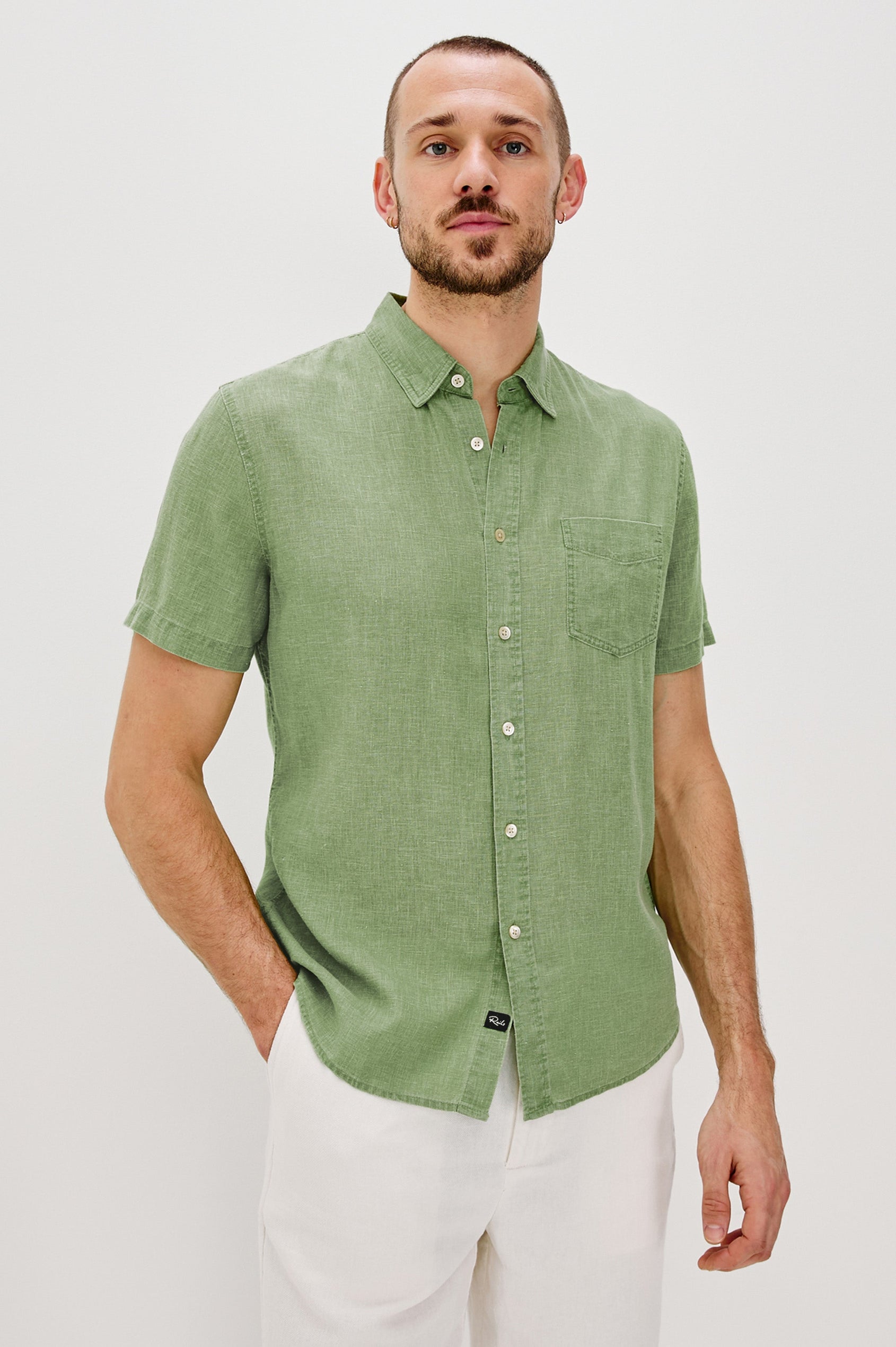 Paros button up short sleeve with front chest pocket and collar in Matcha Colorway- front view on model