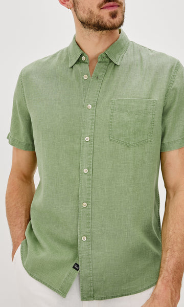 Paros button up short sleeve with front chest pocket and collar in Matcha Colorway- front view on model