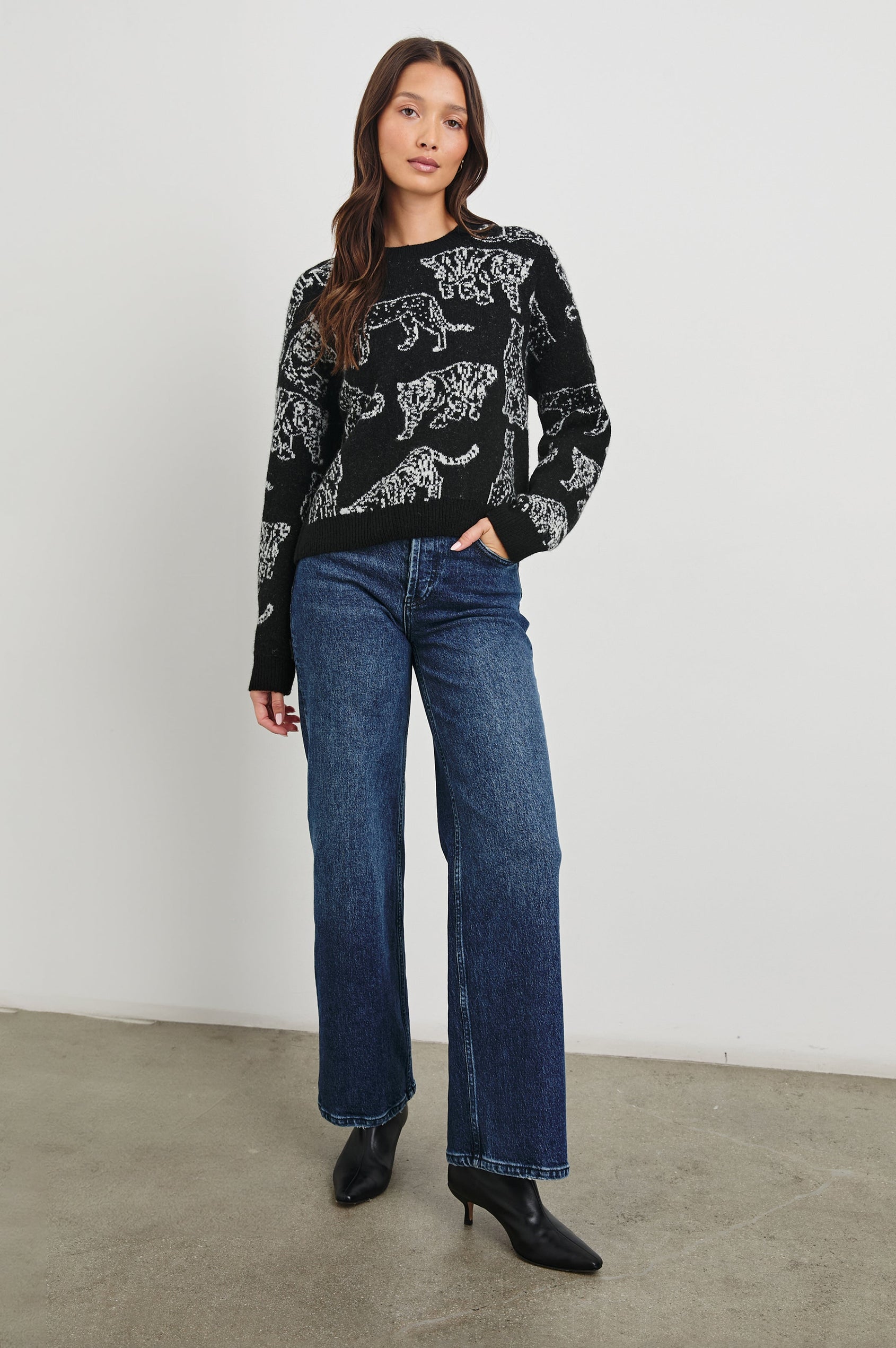 Perci Long-Sleeved Sweater with Crew Neck and Ribbed Trim in Charcoal Cats Colorway, white wild cats on Charcoal - Front Full Body View Featured on Model