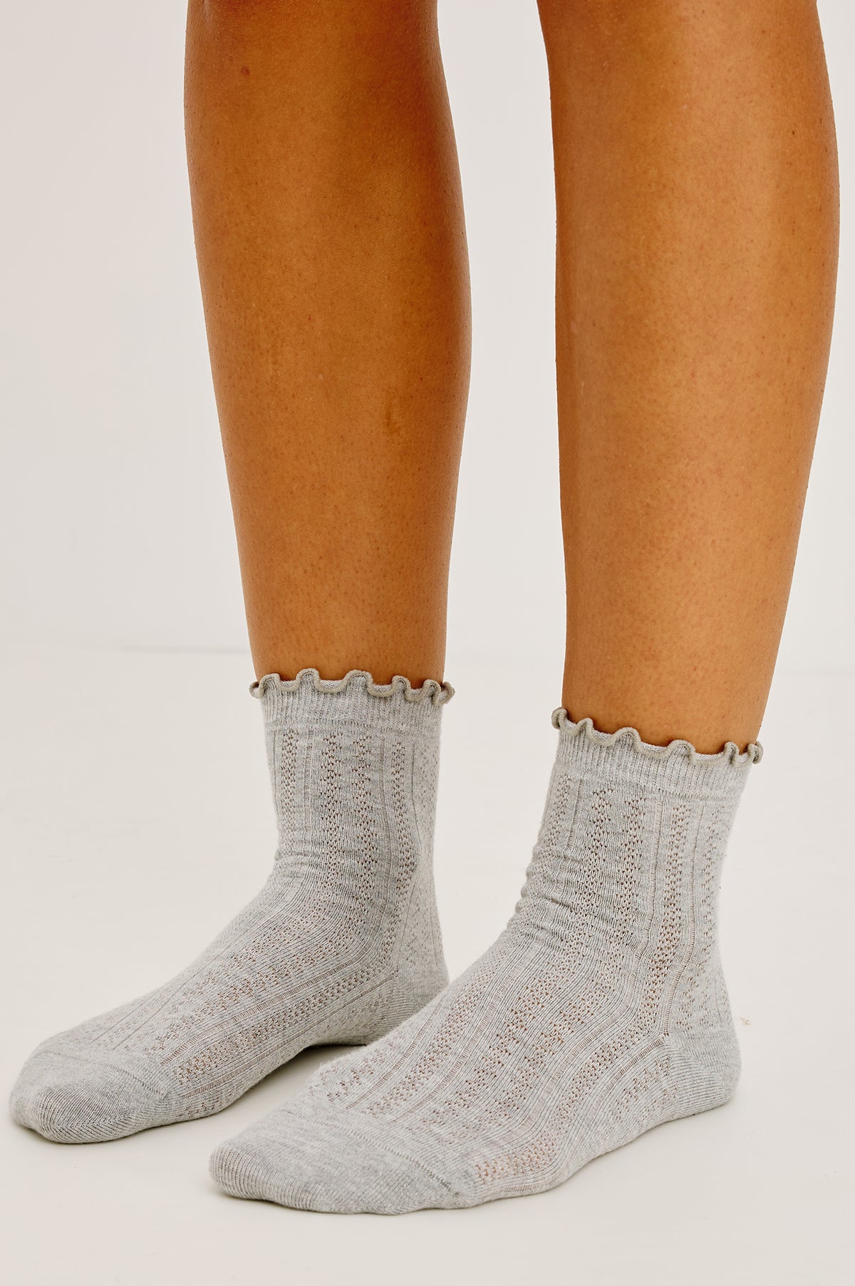 Pointelle Crew Socks in Soft Cotton Blend With Ruffle Trim in Heather Grey Colorway - Upper Body Front Detail View Featured on Model.