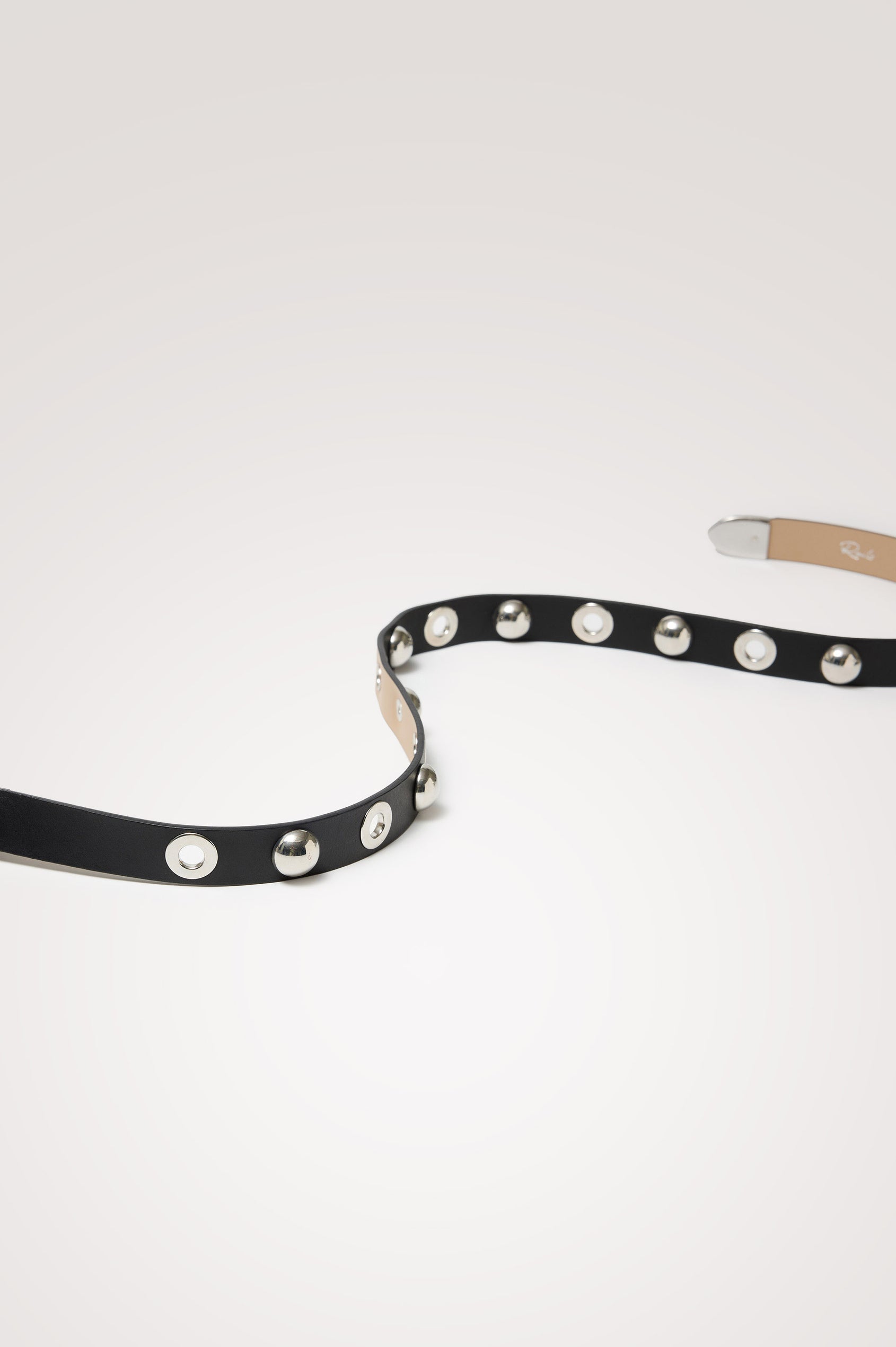 Presley Slim Belt in Leather With Adjustable Buckle and Grommet and Stud Hardware Detailing - Product View Featured