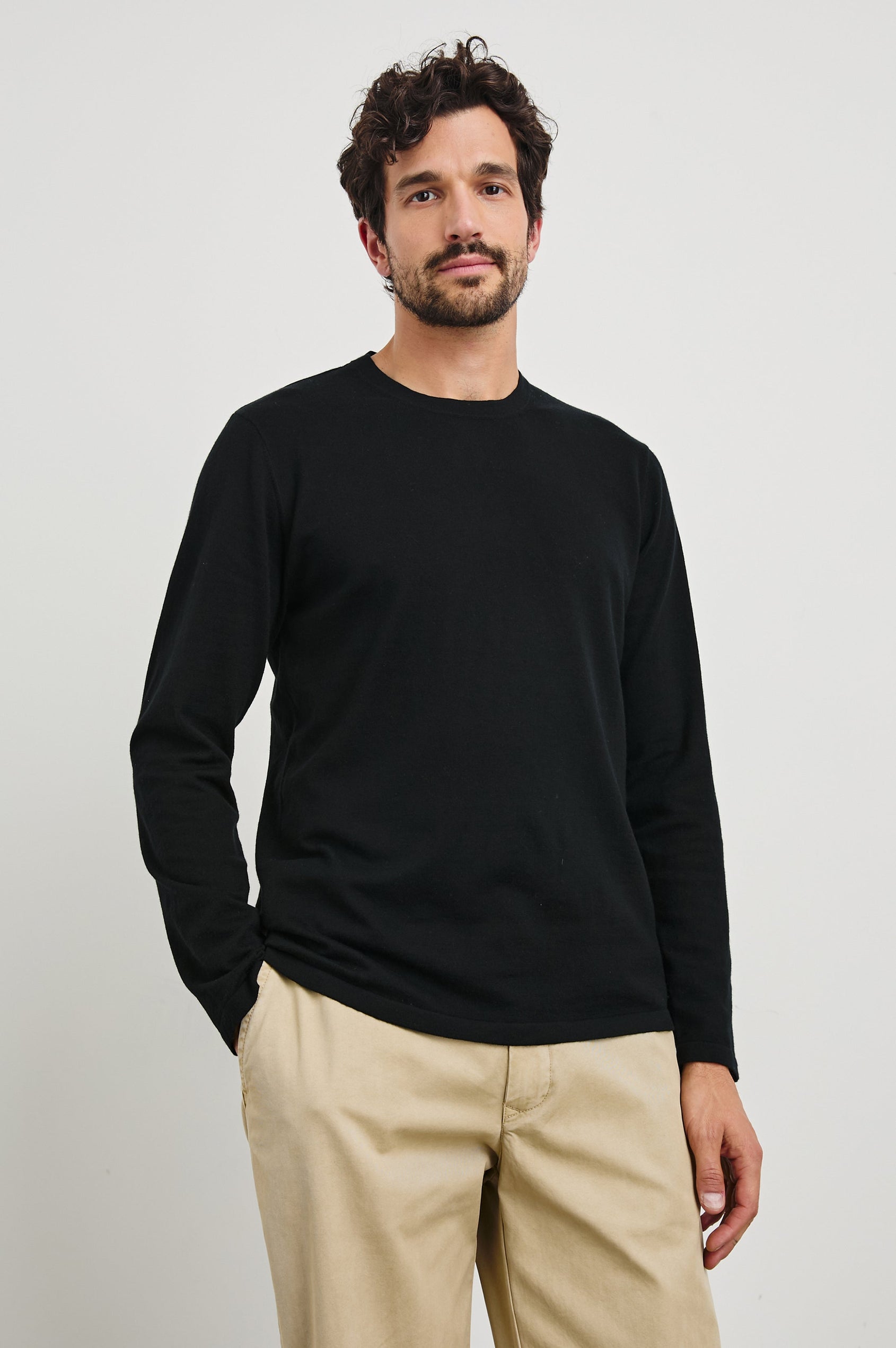 Quentin Cotton Cashmere Long Sleeve Tee with a Crew Neck in Black Colorway - Front View Featured on Model