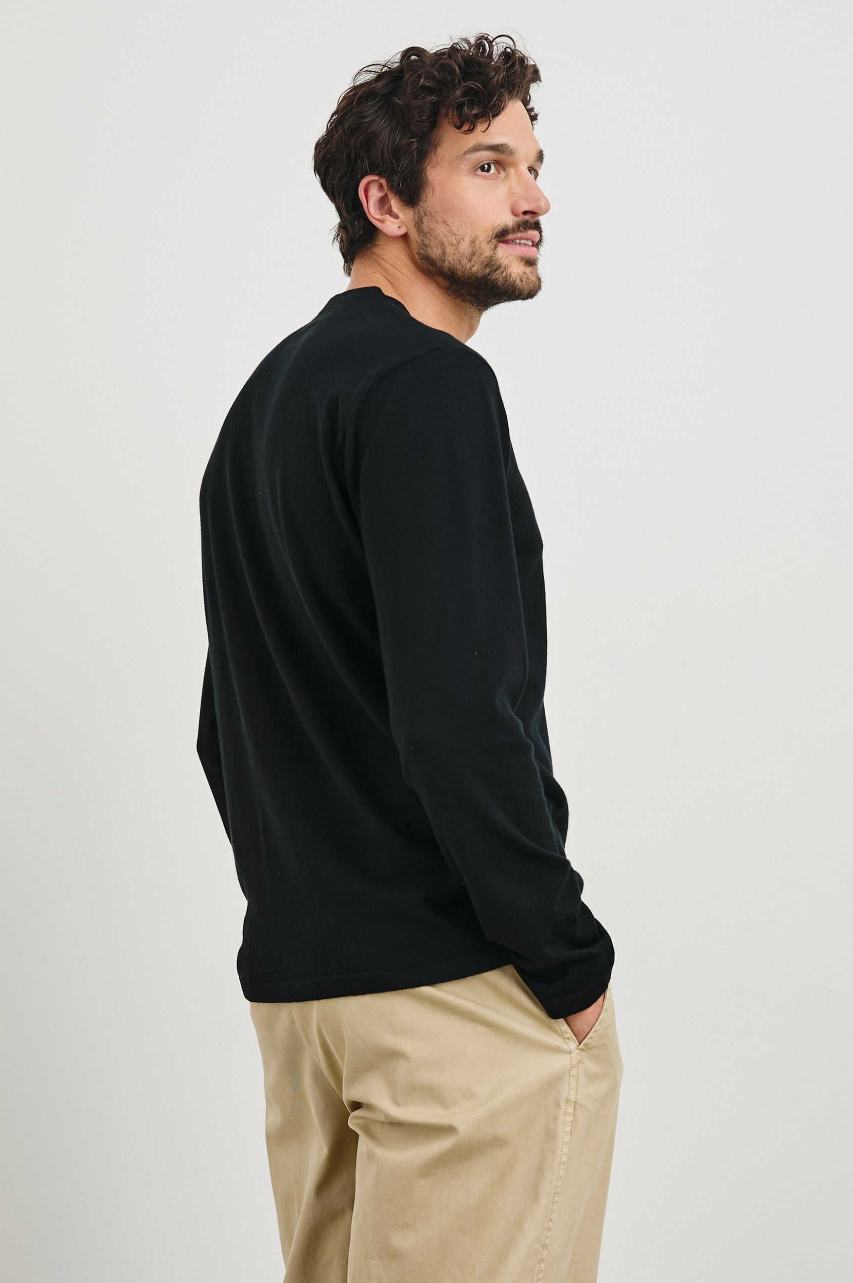 Quentin Cotton Cashmere Long Sleeve Tee with a Crew Neck in Black Colorway - Back View Featured on Model
