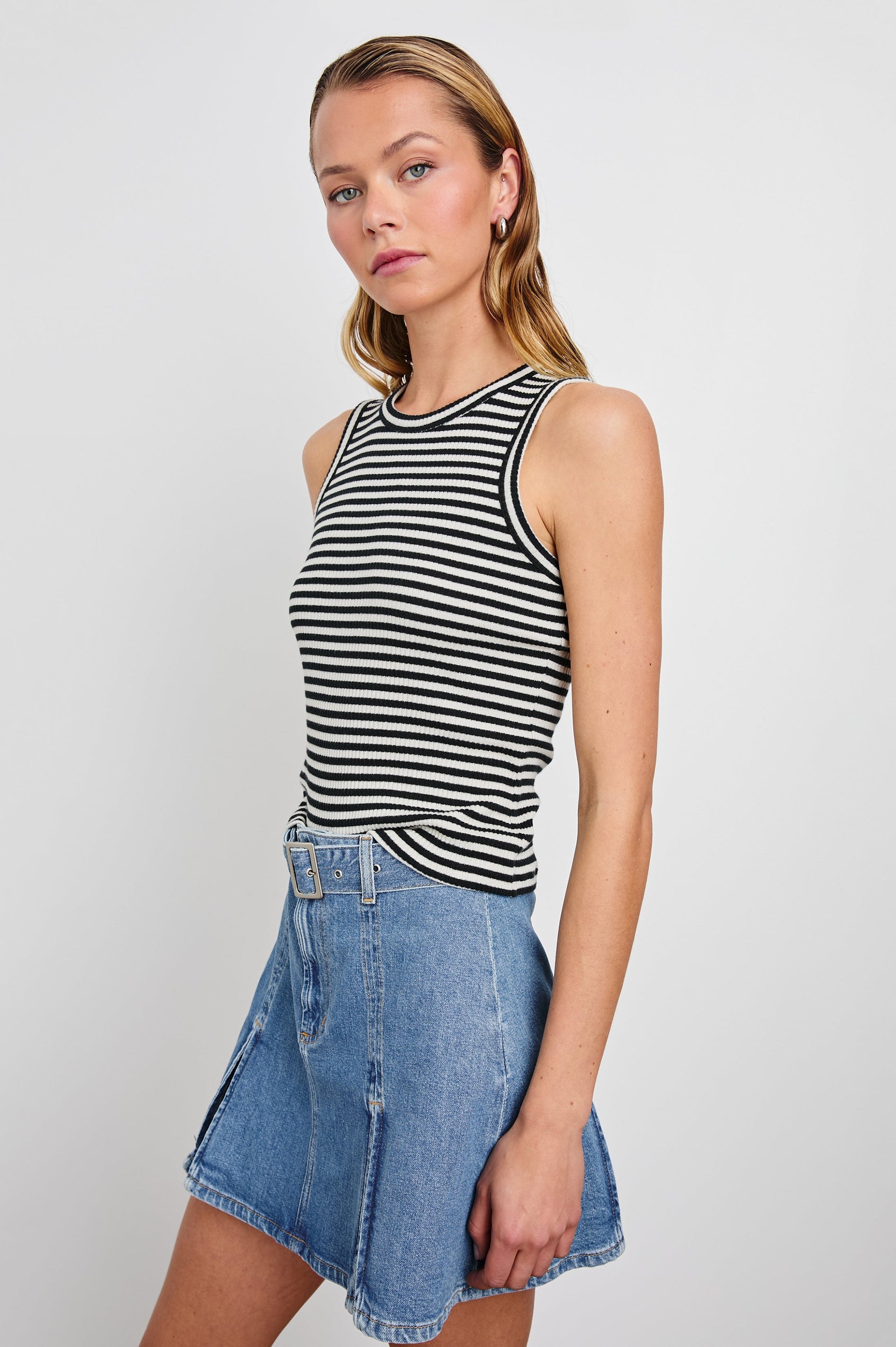 The Racer Ribbed Tank with a Crew Neckline in Black Birch Stripe Colorway, Horizontal Stripes - Side Tucked View Featured on Model