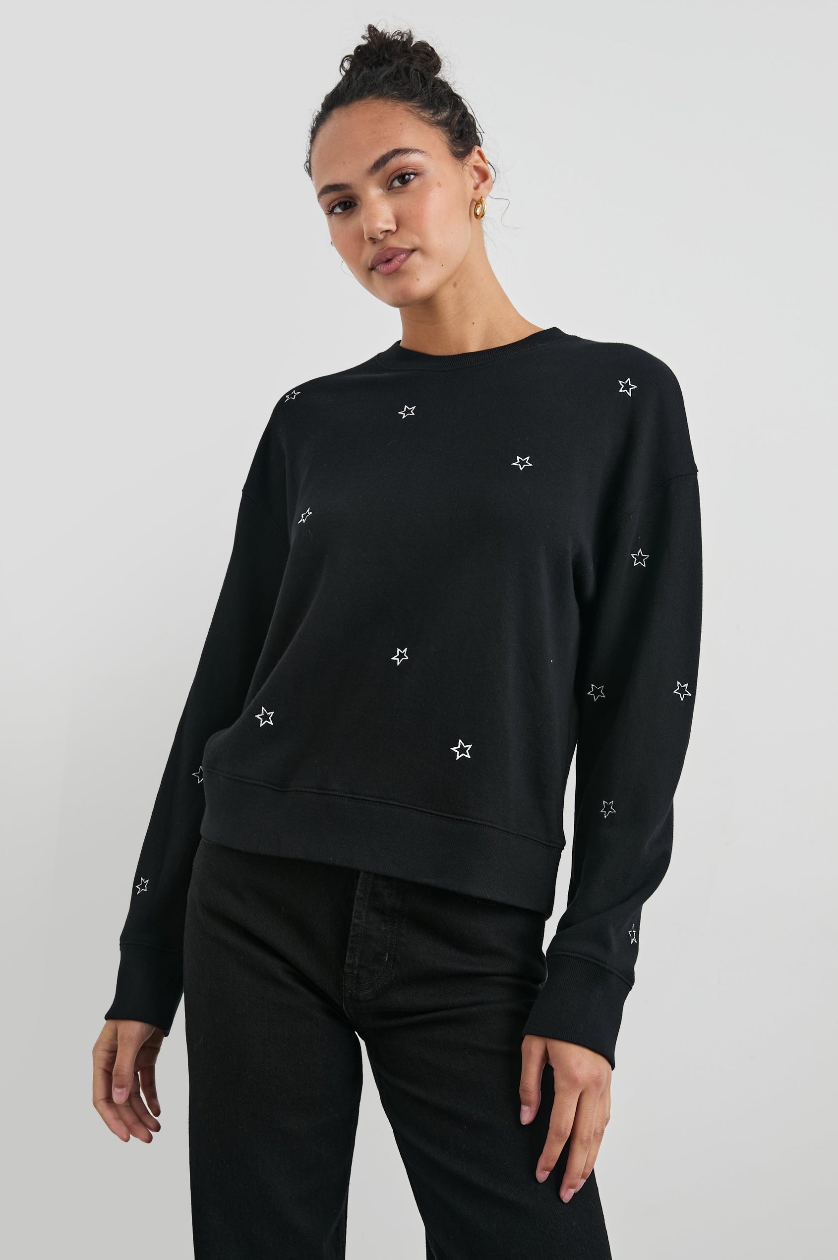 Ramona Long-Sleeve Sweatshirt with a Crew Neck in Black Silver Star Embroidery Colorway, Silver Stars on Black - Front View Featured on Model