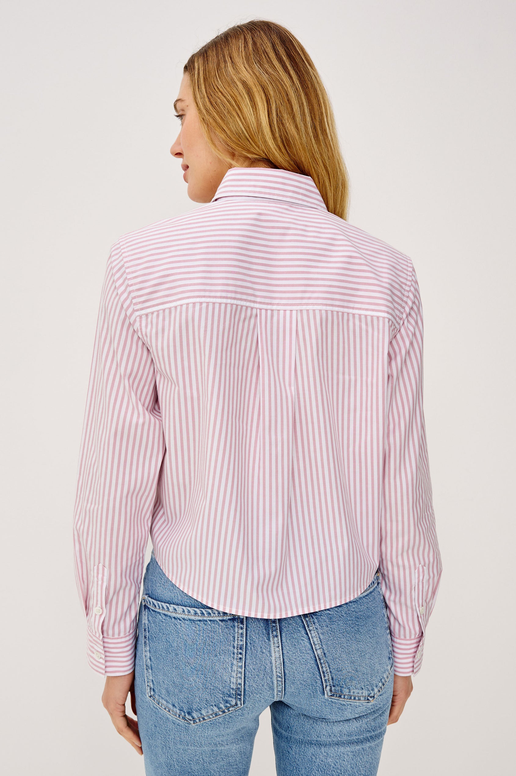 Ramy Cropped Button-Up Shirt in Cotton Poplin With Collar, Front Buttons, and Long Sleeves in Rose Stripe Colorway - Upper Body Back View Featured on Model
