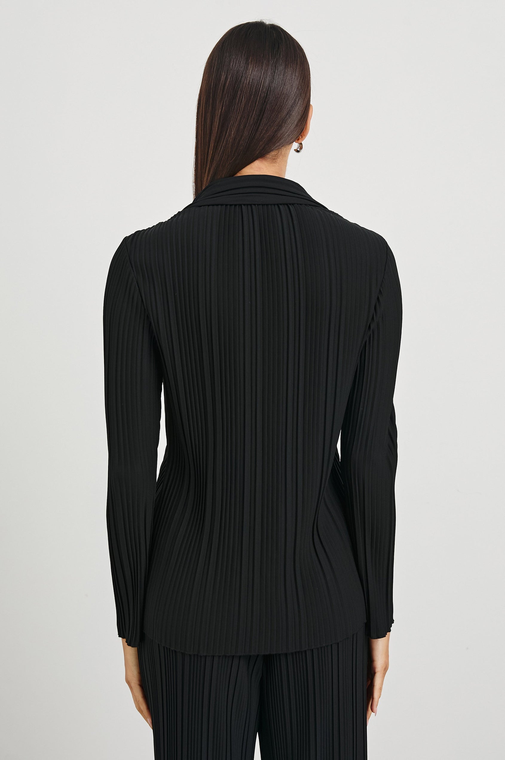 Raya Long Sleeve Button Up without Button Cuffs and with a Collar and Textured Fabric in Jet Colorway - Back View Featured on Model 