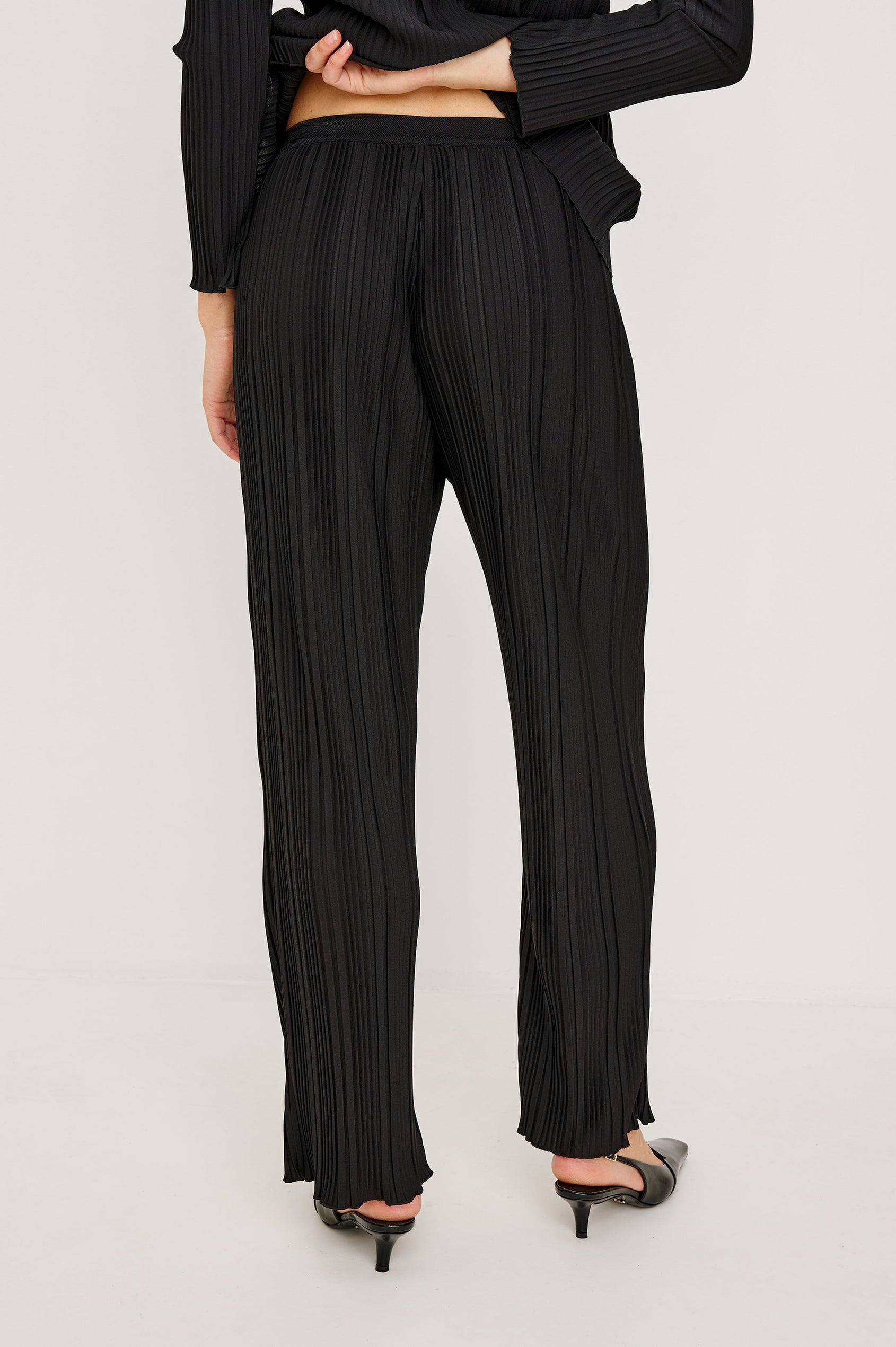 Liana Micro-Pleated Pants with an Elastic Waist in Jet Colorway - Back View Featured on Model 