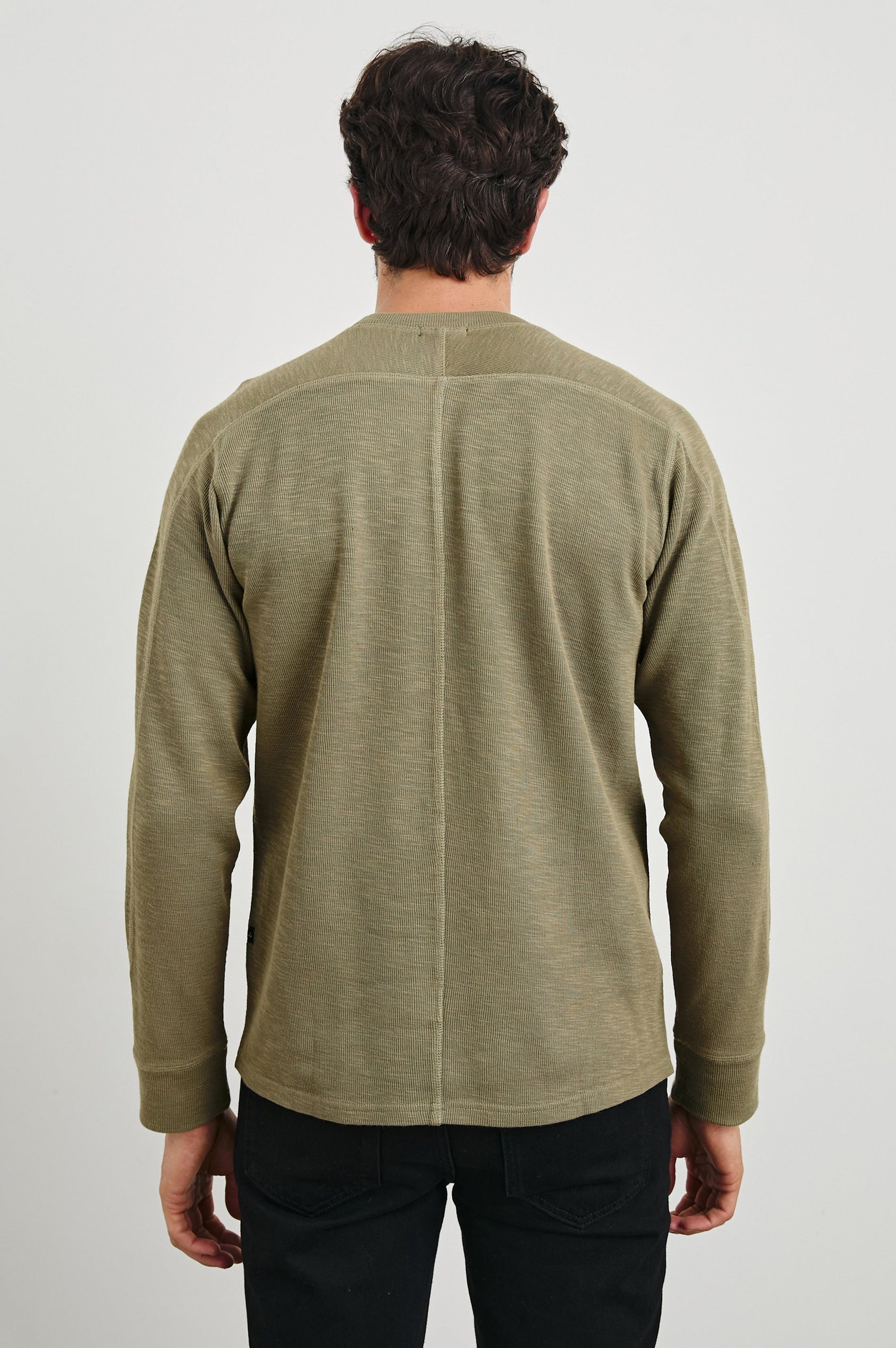 Rheese Long-Sleeve Thermal with Crew Neck and Statement Seams on Sleeves and Back in Green Olive Colorway - Back View Featured on Model