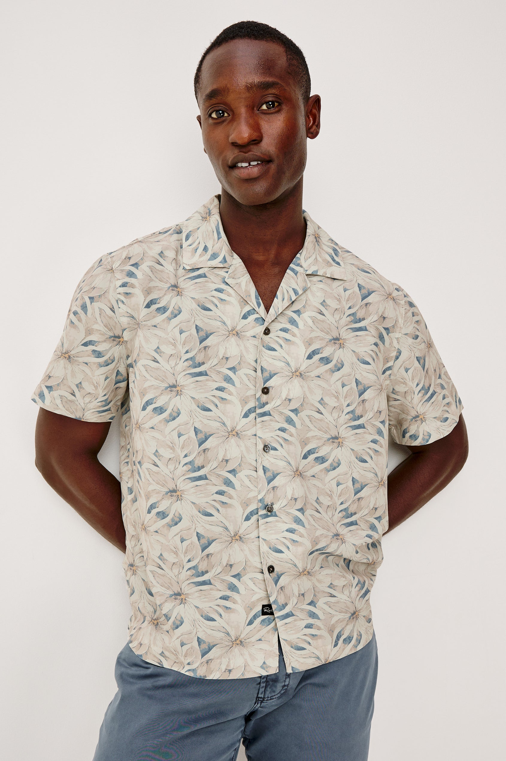 Rhodes Boxy Button-Up Shirt in Crepe With Back Box Pleat, Vintage-Inspired Notched Collar, Front Buttons, and Short Sleeves in Callalily Cream Colorway - Upper Body Front View Featured on Model