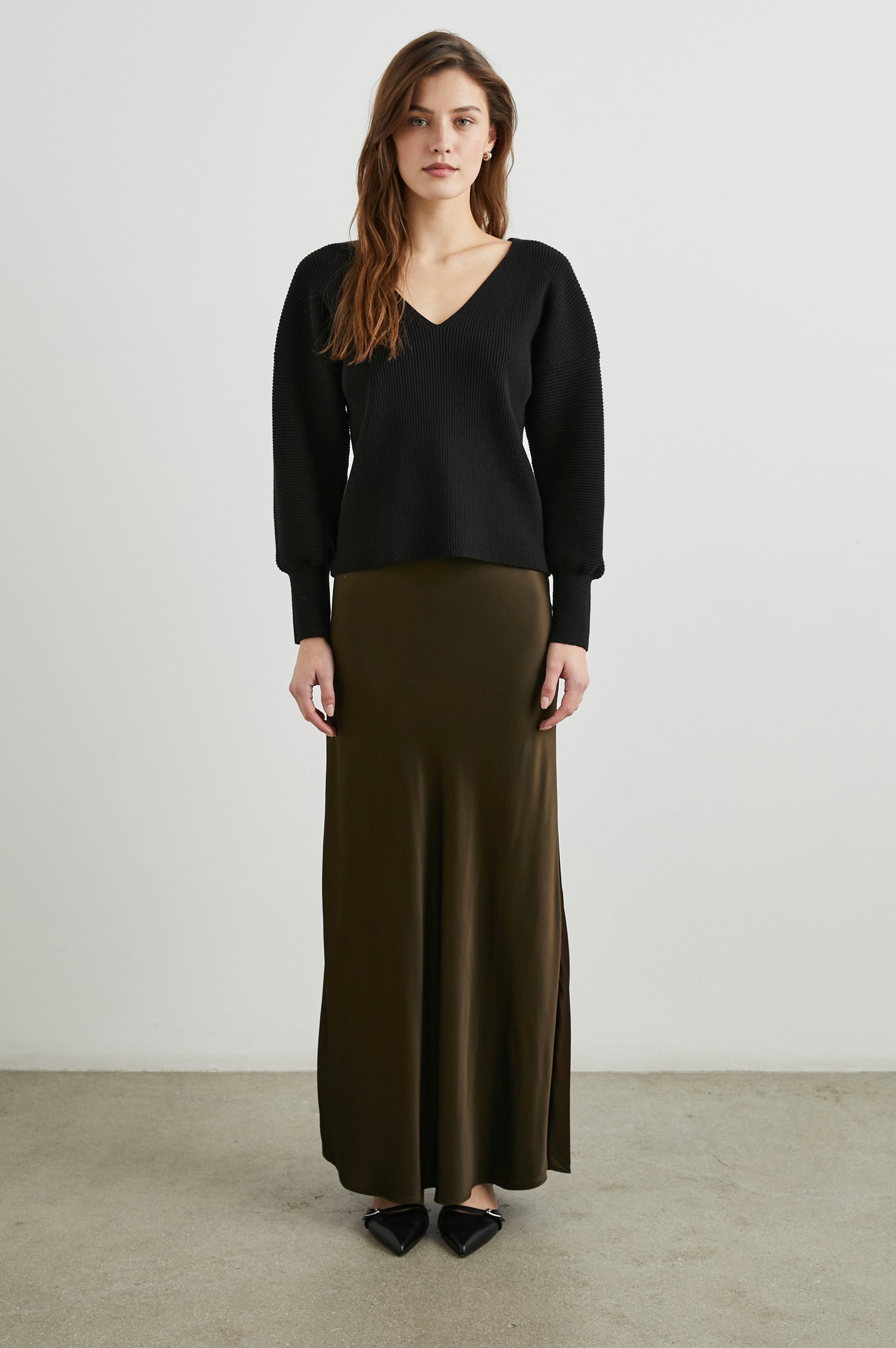 Romina Maxi Skirt in Dark Moss Colorway - Front Full Body View Featured on Model