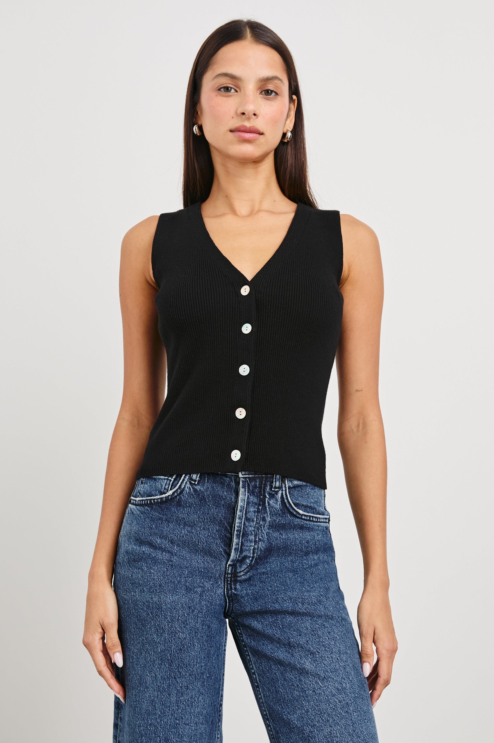 Rosa Ribbed Sleeveless Vest with a V Neckline and Buttons Down the Front in Black Colorway - Front View Featured on Model