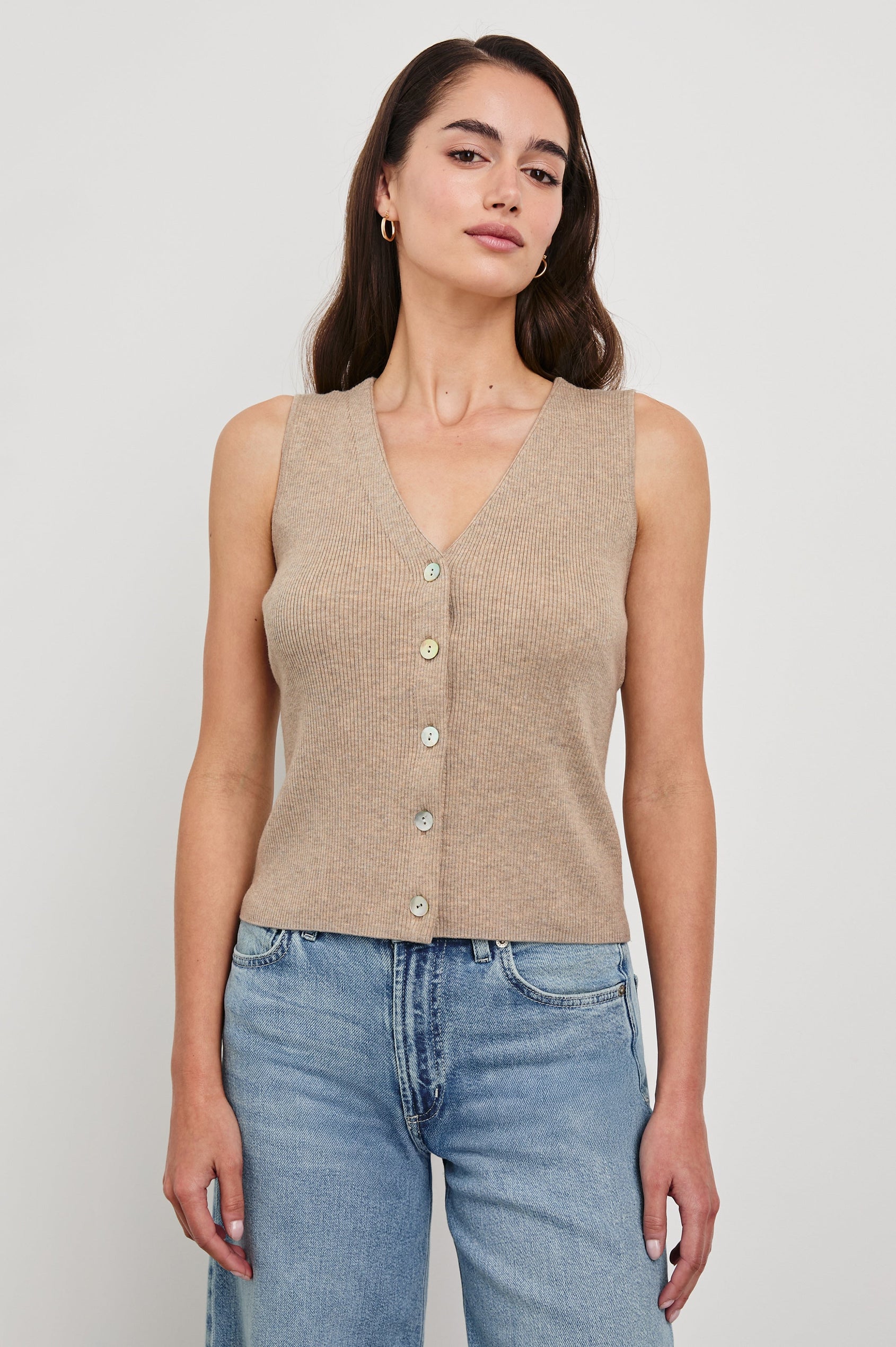 Rosa Ribbed Sleeveless Vest with a V Neckline and Buttons Down the Front in Oatmeal Colorway - Front View Featured on Model