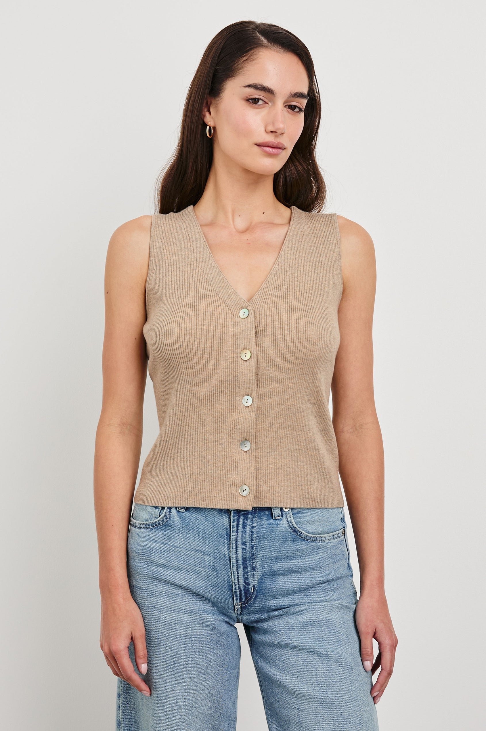 Rosa Ribbed Sleeveless Vest with a V Neckline and Buttons Down the Front in Oatmeal Colorway - Front View Featured on Model