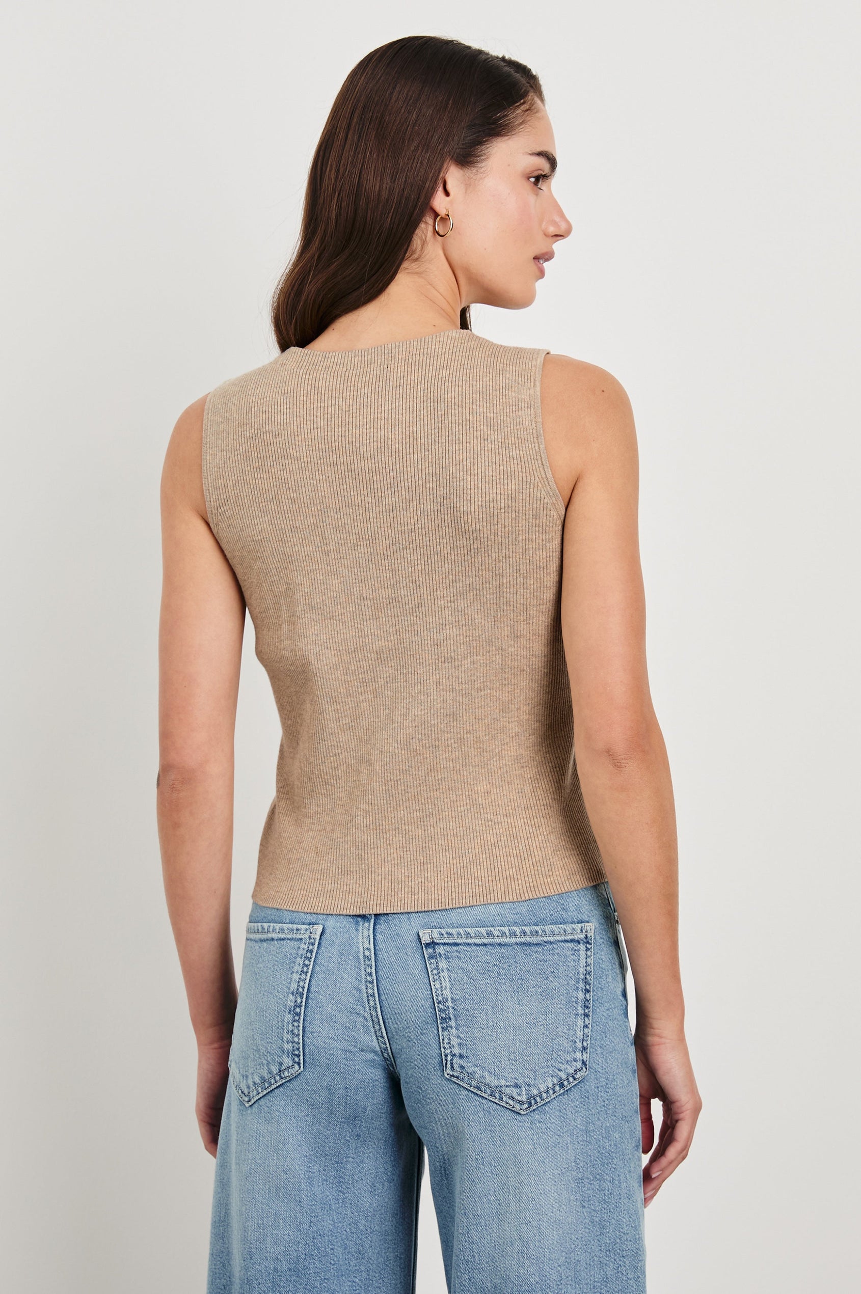 Rosa Ribbed Sleeveless Vest with a V Neckline and Buttons Down the Front in Oatmeal Colorway - Back View Featured on Model