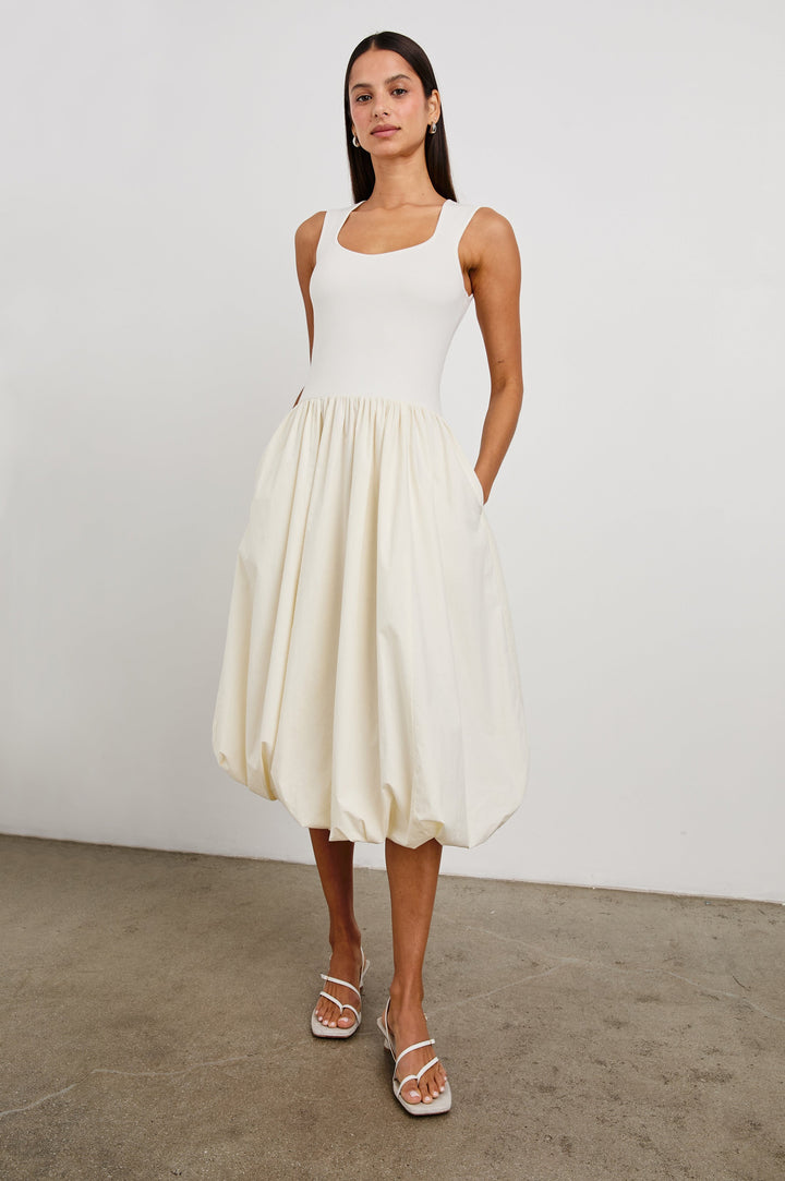 Rosalind tank midi dress with scoop neck, fitted bodice, and bubble skirt in Ivory - full body front view on model