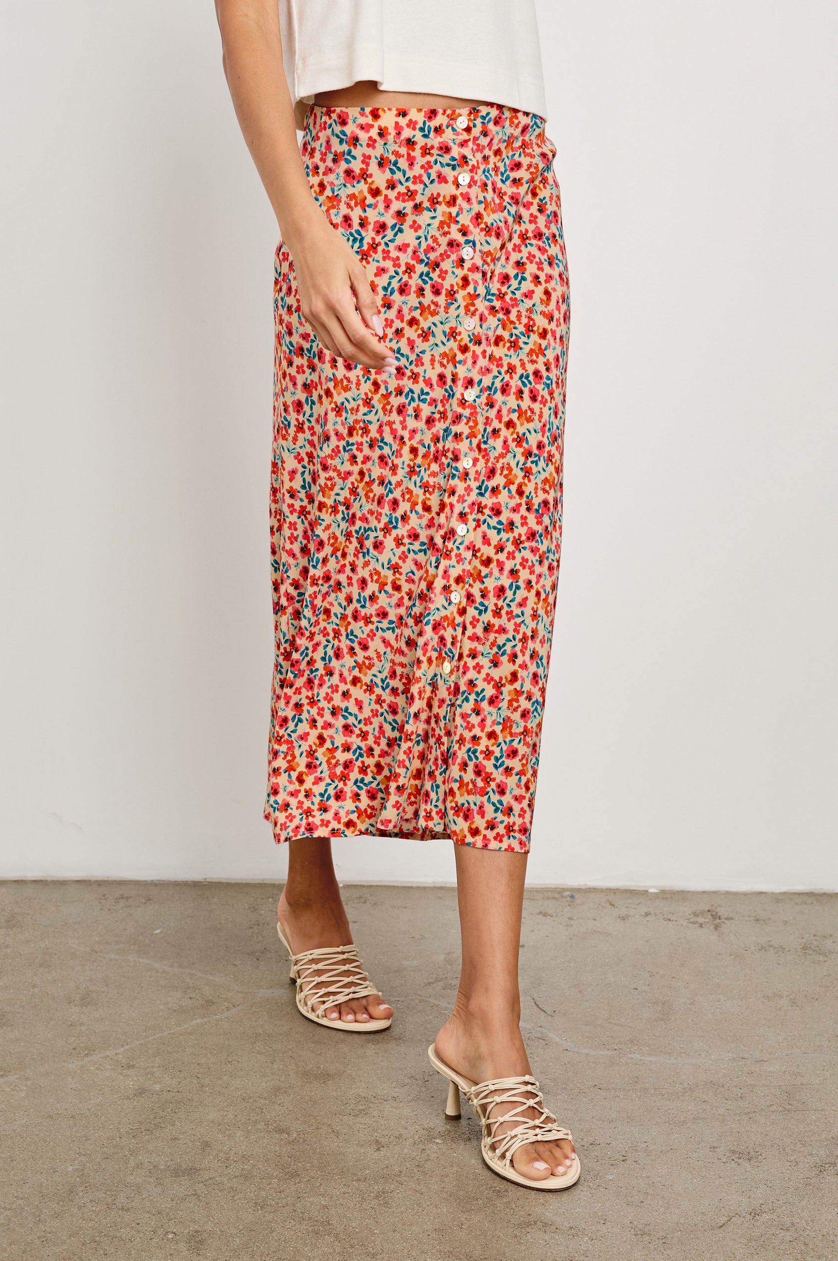 Rosetta Midi Skirt with White Buttons Down the Front in Red Posy Colorway, with Red Posies on Tan - Front View Featured on Model 