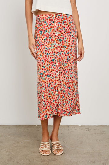 Rosetta Midi Skirt with White Buttons Down the Front in Red Posy Colorway,  with Red Posies on Tan - Front View Featured on Model 