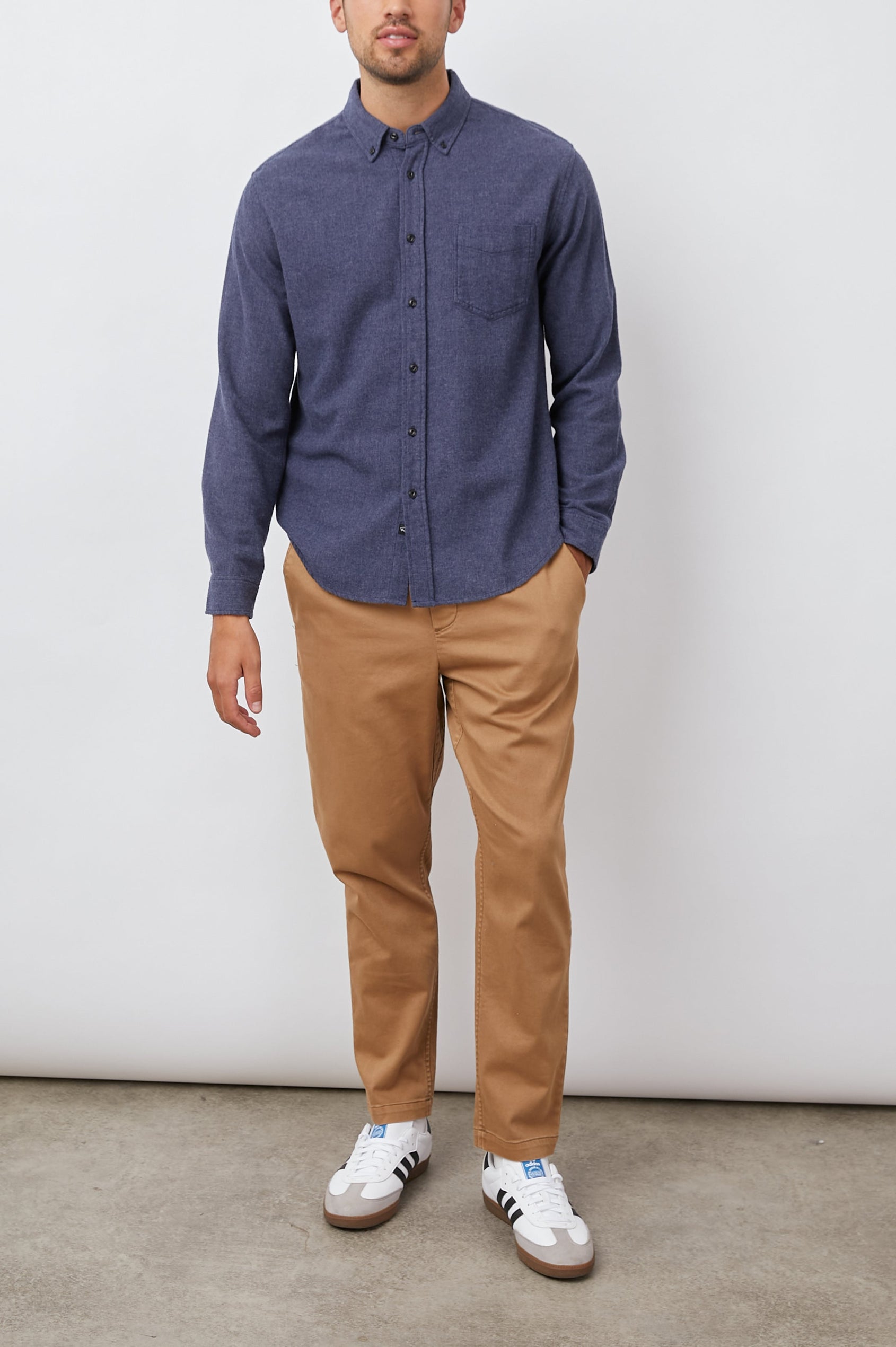 Runson Long-Sleeve Button Down with a Chest Patch Pocket in Heather Blue Colorway - Front Full Body View Featured on Model