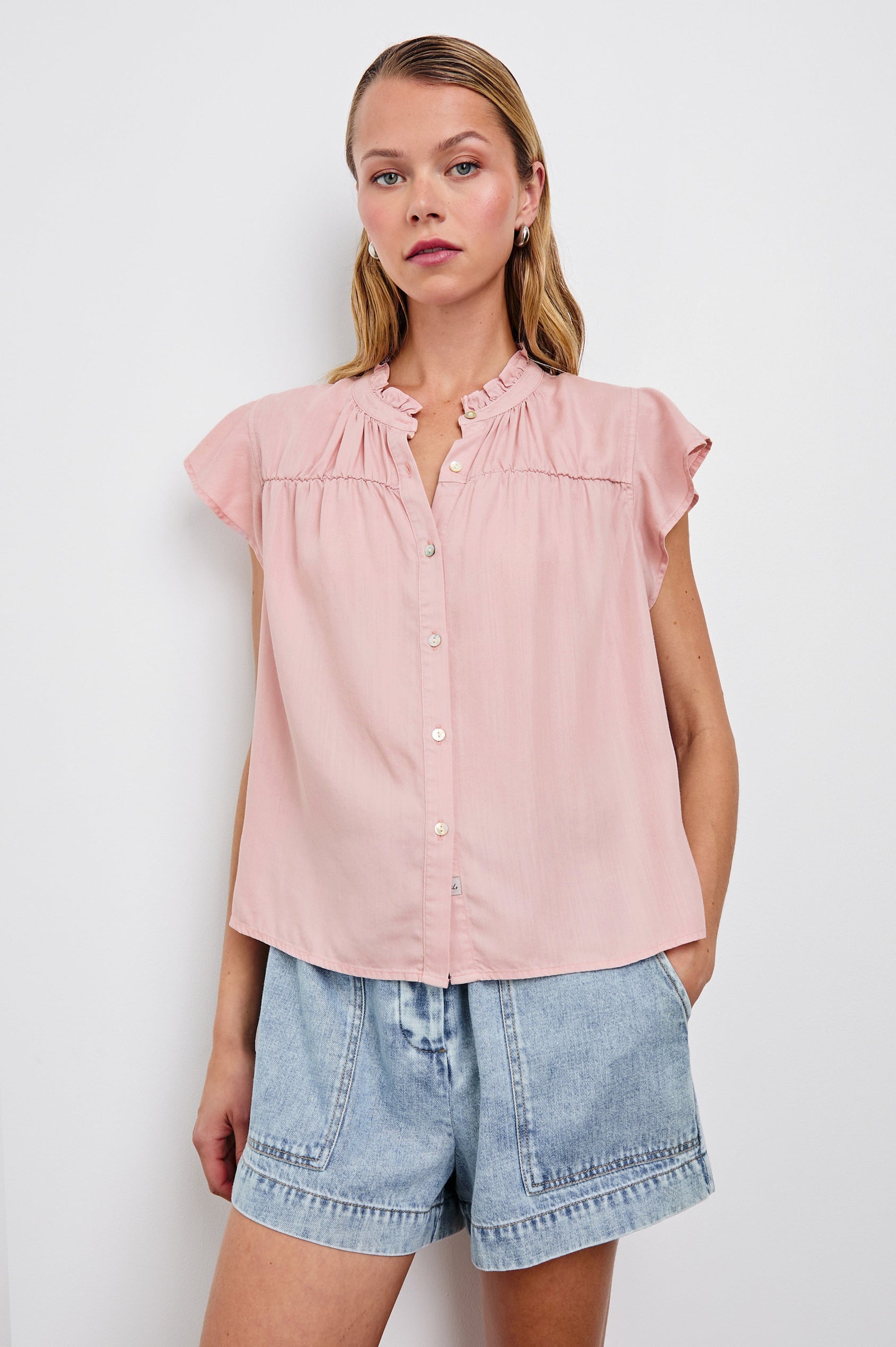 Ruthie Top with Flutter Cap Sleeves, a Ruffled Banded Collar, Buttons Down the Front, and Soft Shirring at Front Yoke in Dusty Rose Colorway - Front  View Featured on Model