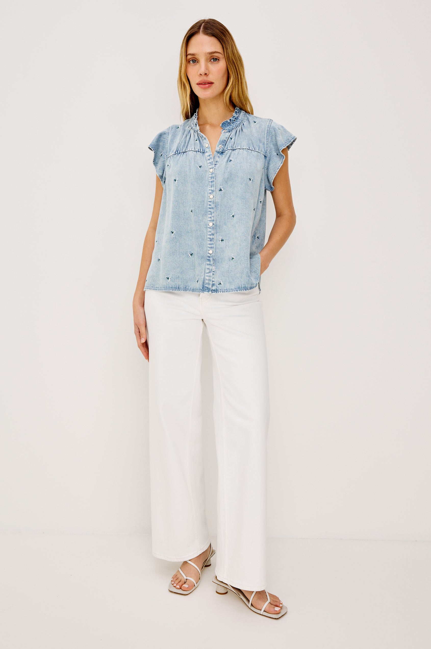 Ruthie Flutter Sleeve High Neck Front Button Ruffle Trim Yoke Detail Top in Ivory Carnations Colorway - Upper Body Front View Featured on Model