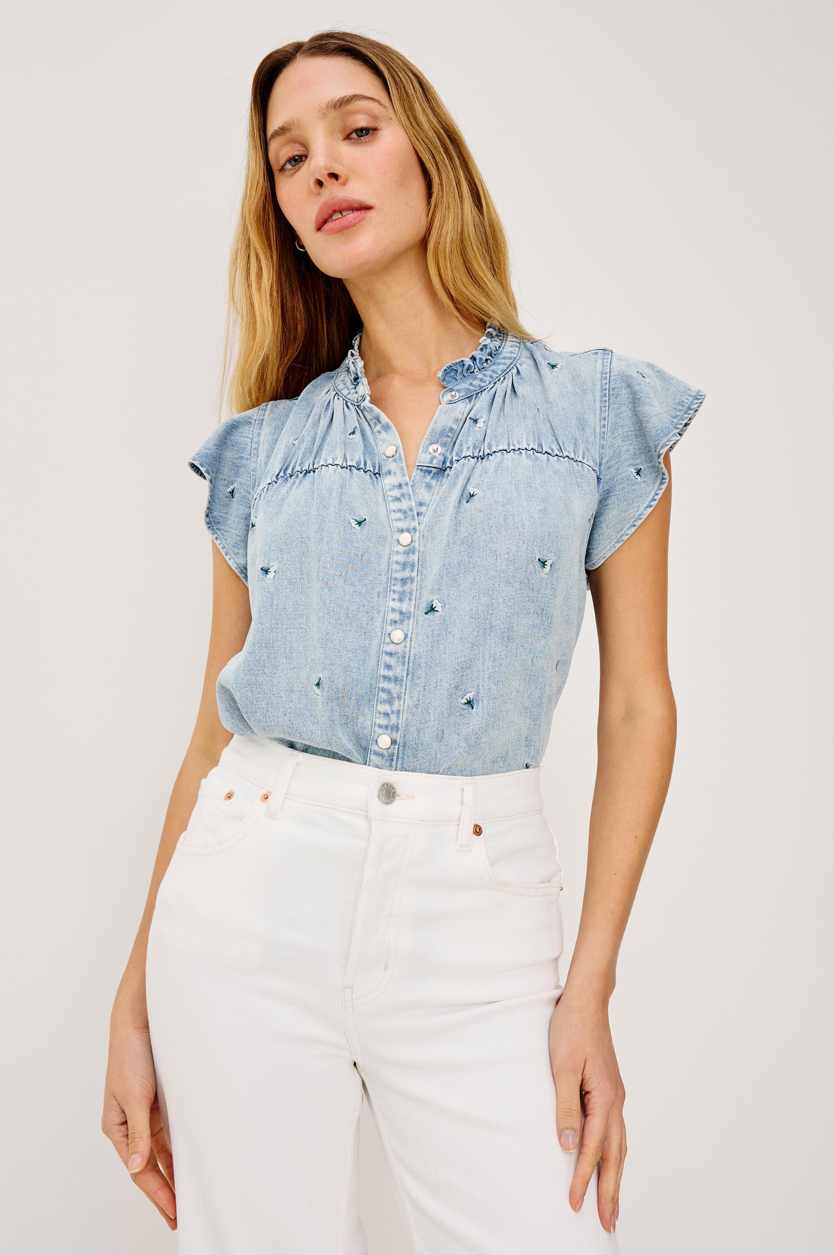 Ruthie Flutter Sleeve High Neck Front Button Ruffle Trim Yoke Detail Top in Ivory Carnations Colorway - Upper Body Front View Featured on Model