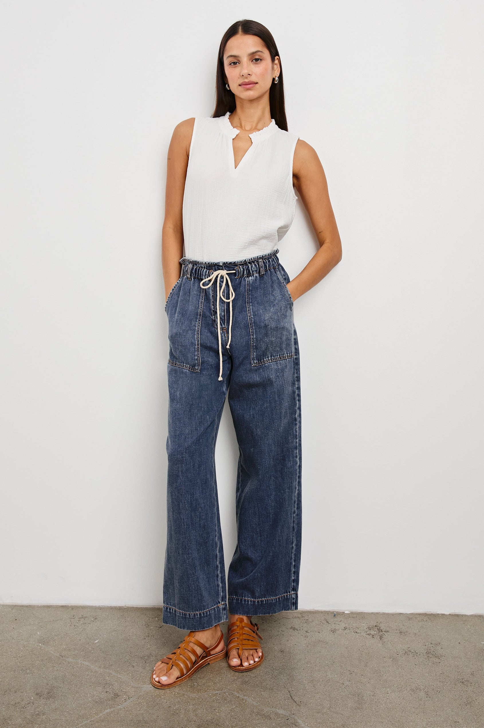 Ryan Pants with a Corded Drawstring Waist, Large Front Pockets and two Back Pockets in Classic Blue Colorway - Front Full Body View Featured on Model