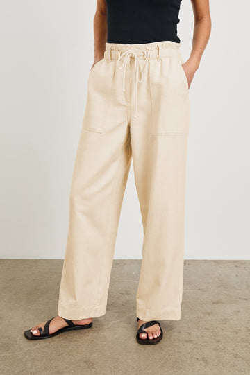 Ryan high rise linen pant with shirred waist and drawstring in Ecru - front view on model