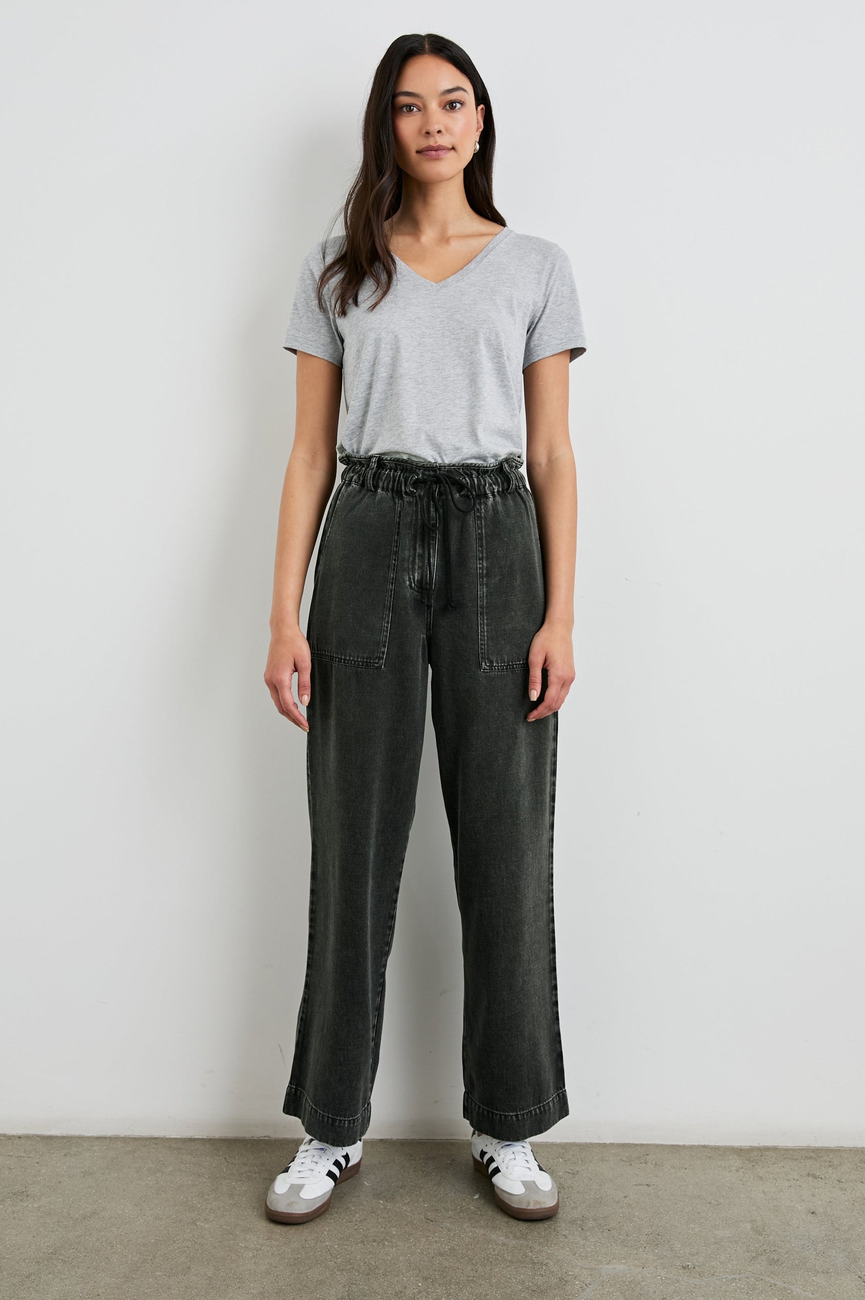 Ryan Pants with a Corded Drawstring Waist, Large Front Pockets and two Back Pockets in Faded Black Colorway - Front Full Body View Featured on Model