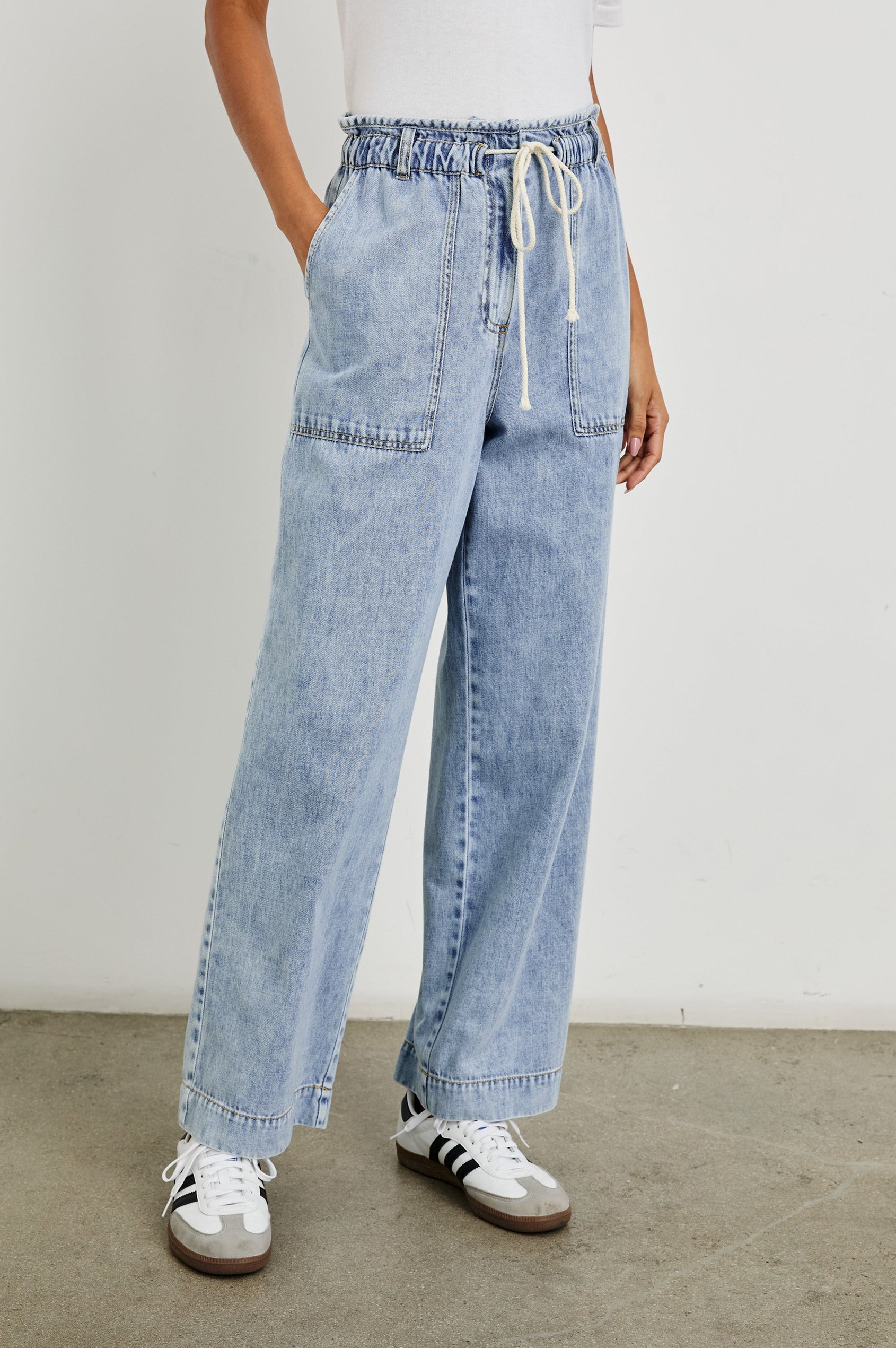 Ryan high rise linen pant with shirred waist and drawstring in light wash Faded Indigo- front view on model