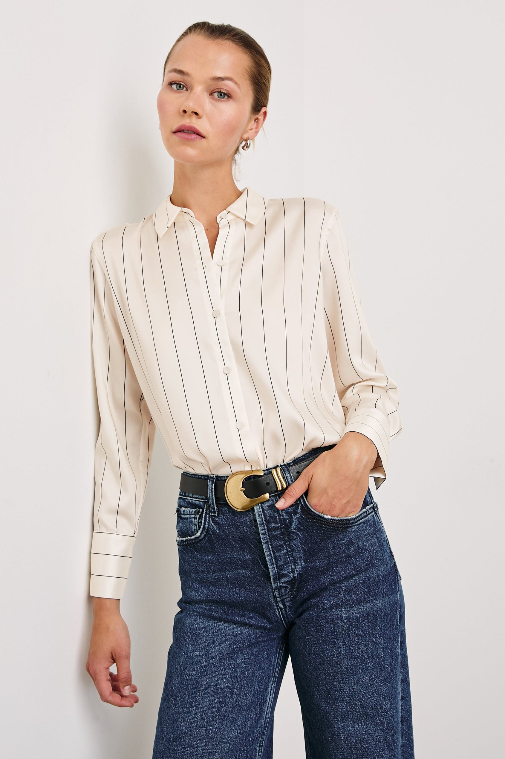 Saige Long-Sleeve Button Up in Brixton Stripe Colorway, Thin Black Stripes on Cream - Front Tucked View Featured on Model