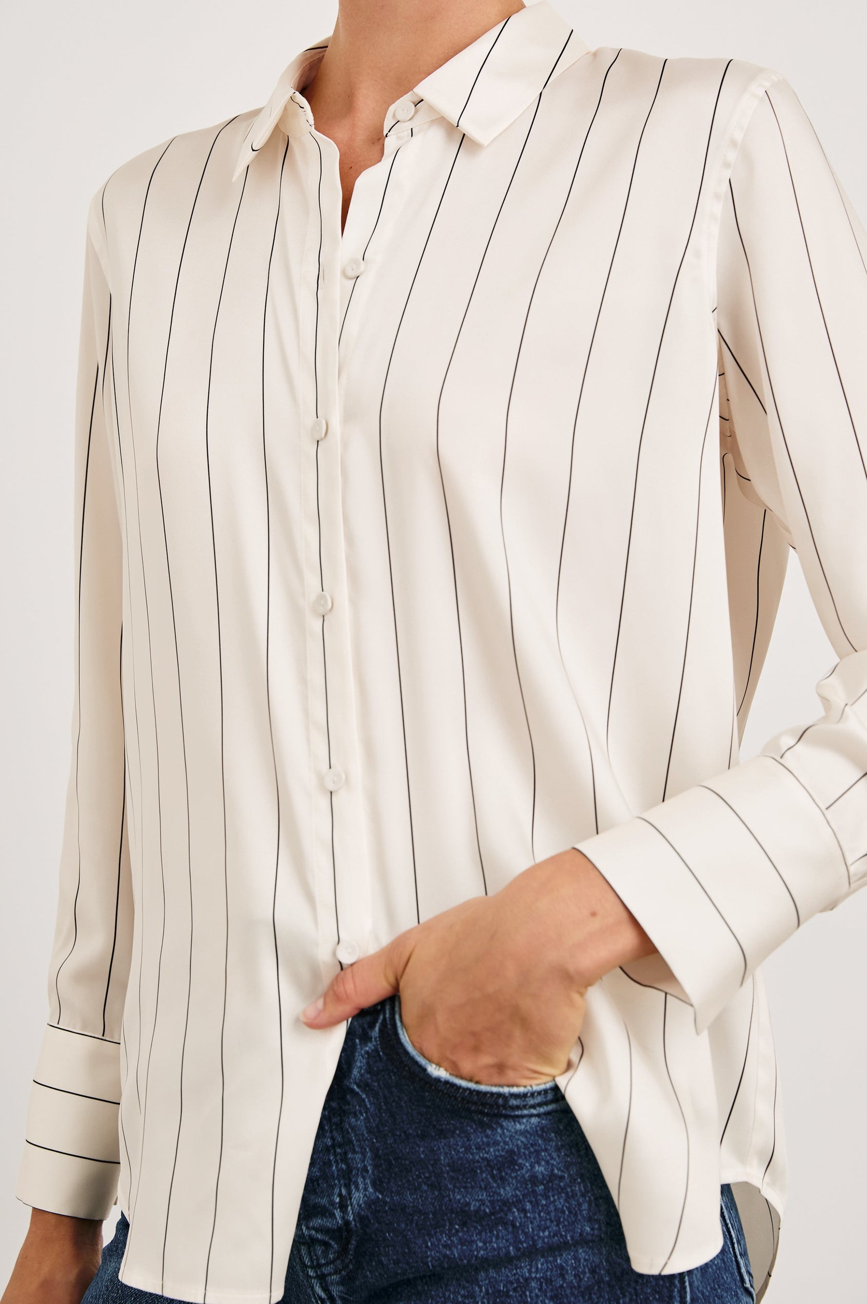Saige Long-Sleeve Button Up in Brixton Stripe Colorway, Thin Black Stripes on Cream - Front View Featured on Model
