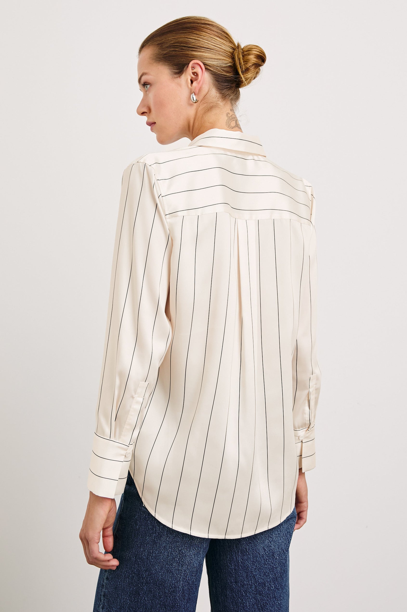Saige Long-Sleeve Button Up in Brixton Stripe Colorway, Thin Black Stripes on Cream - Back View Featured on Model