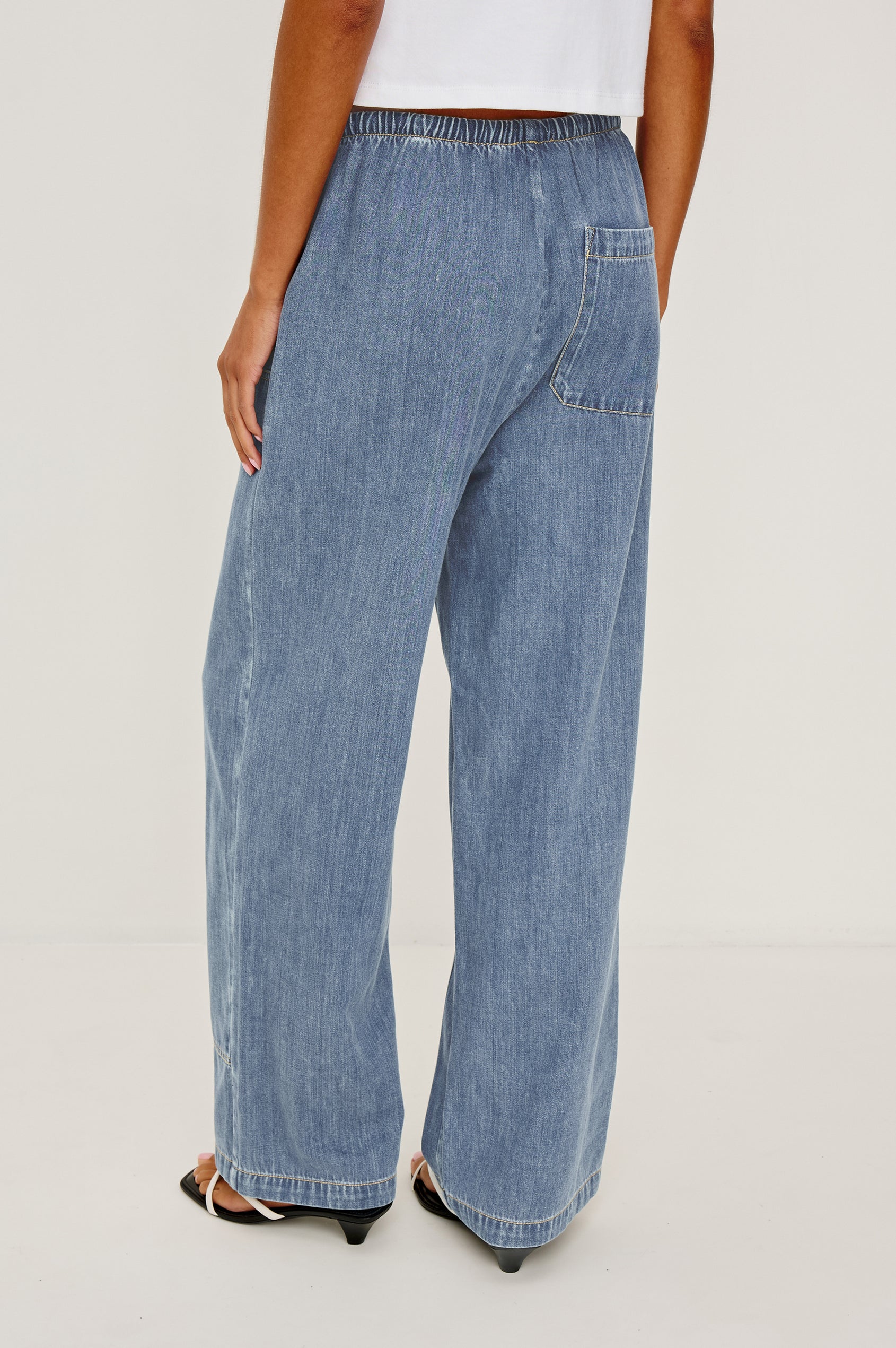 Sanderson Pant in Cotton Lyocell Denim With Relaxed Fit, Drawstring Waist Tie, and Carpenter-Style Leg Panels - Lower Body Back View Featured on Model