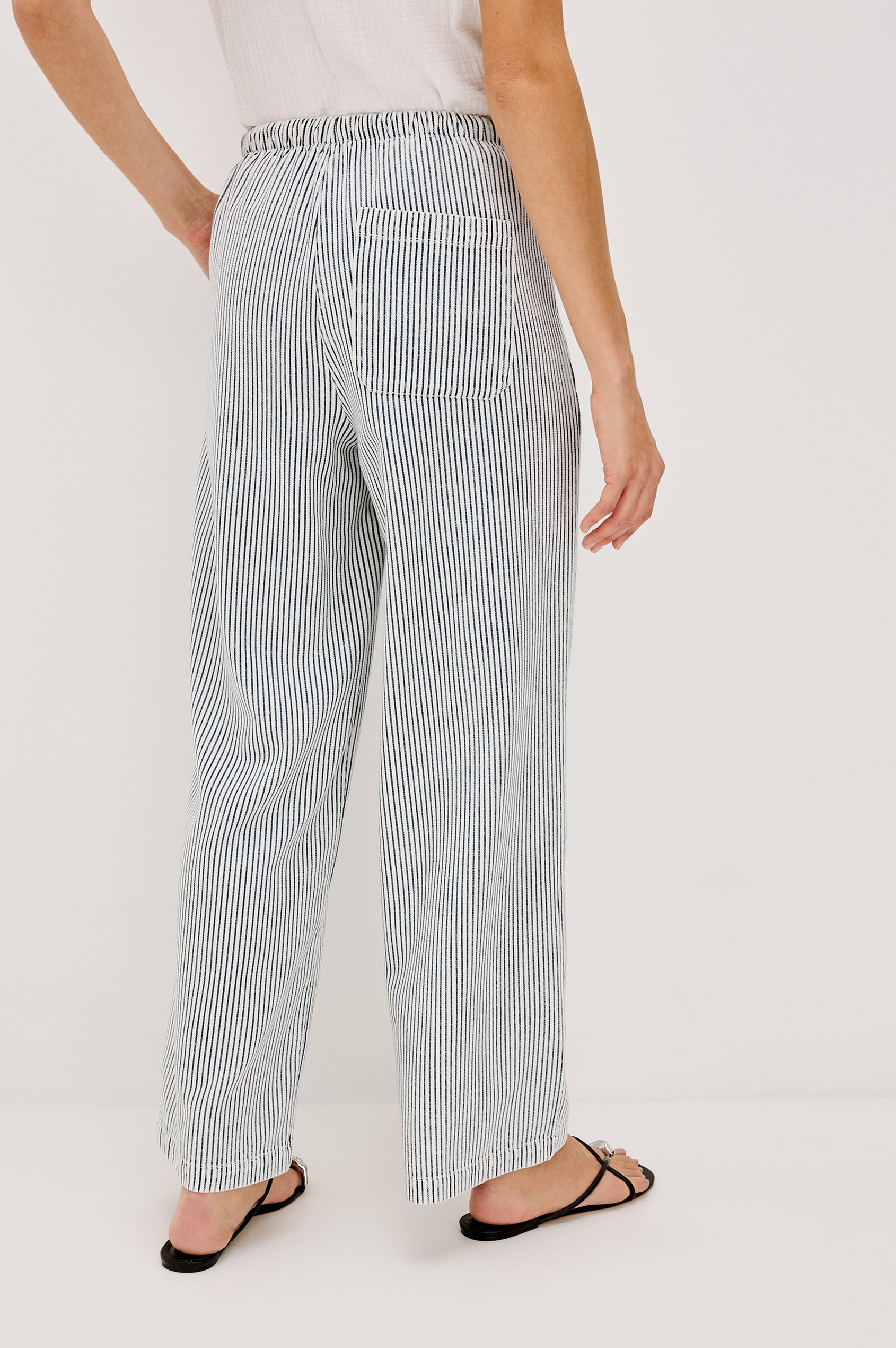 Sanderson Pull on Wide Leg Pant with a Drawstring Waistband and Side Pockets in Indigo Railroad Stripe Colorway. Back View Shown on Model.
