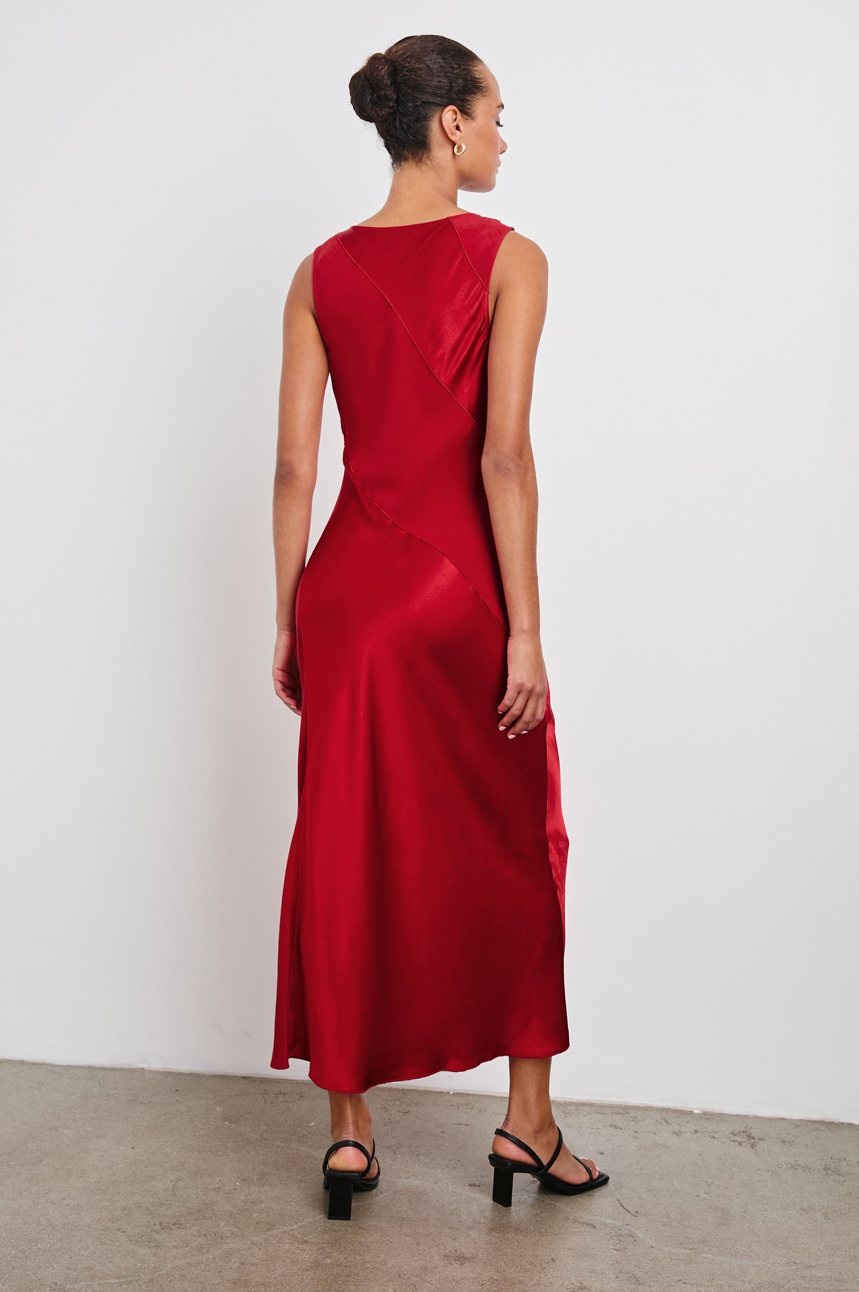 Sanya Sleeveless Midi Dress with a Crew Neck, Side Slit to the Upper Thigh, and Contrasting Matte Diagonal Panels in Scarlet Colorway - Back Full Body View Featured on Model