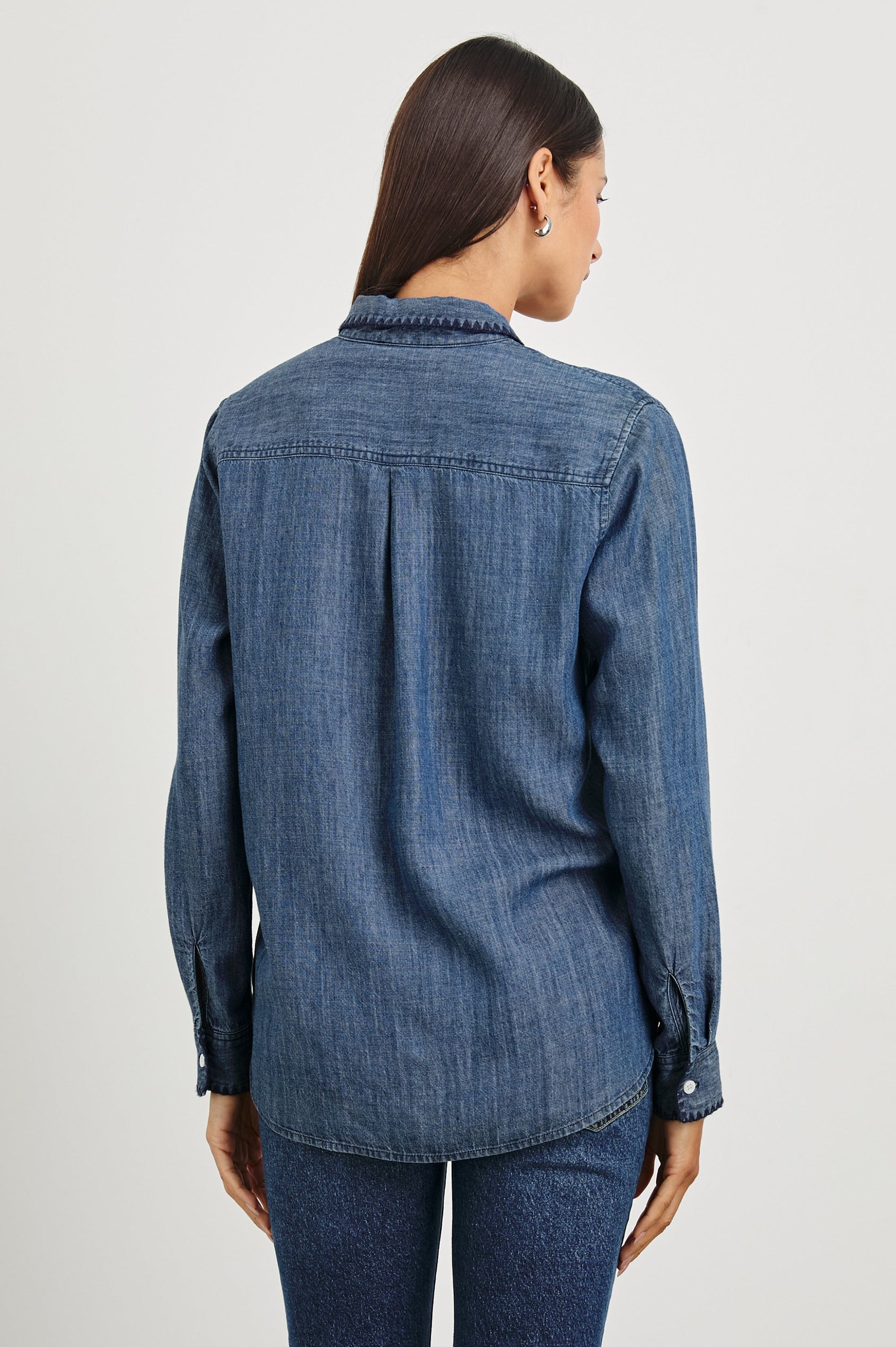 Saya Long-Sleeve, Button-Down Shirt with Collar, Buttoned Cuffs, Chest Patch Pocket, Black Blanket Stich Trim in Dark Vintage Wash Colorway - Back Untucked View Featured on Model