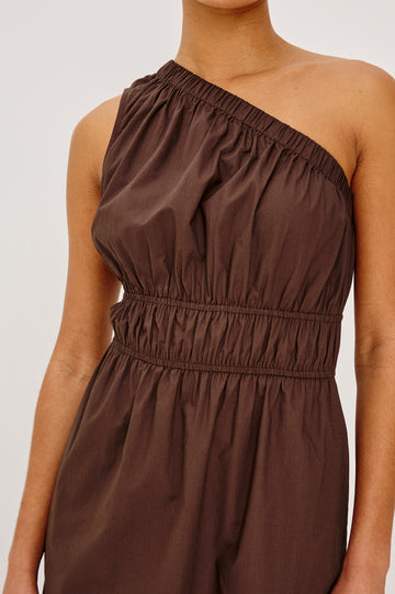 Selani Midi Dress in Cotton Poplin With One-Shoulder Neckline, Shirred Waistband, Concealed Side Pockets, and Side Slit in Espresso Colorway - Upper Body Close Up Front View Featured on Model